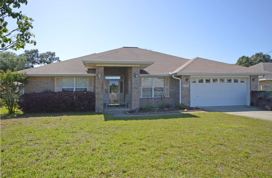 Welcome Home!! This specious 4 bedroom 3 bath, plus a den and formal dining has a lot to offer! The Great Room and halls have tiled flooring and a tiled fireplace. The den is very spacious and the formal dining room has wood floors. The kitchen has granite countertops, stainless steel appliances and a breakfast bar. The kitchen and Great Room are tiled. The Master Suite has ''his and hers'' bathrooms and walk in closets. One bathroom has a garden tub and the other has a separate shower. The large backyard has a privacy fence. This is a very nice neighborhood close to schools and beaches. Call me today for a private viewing.