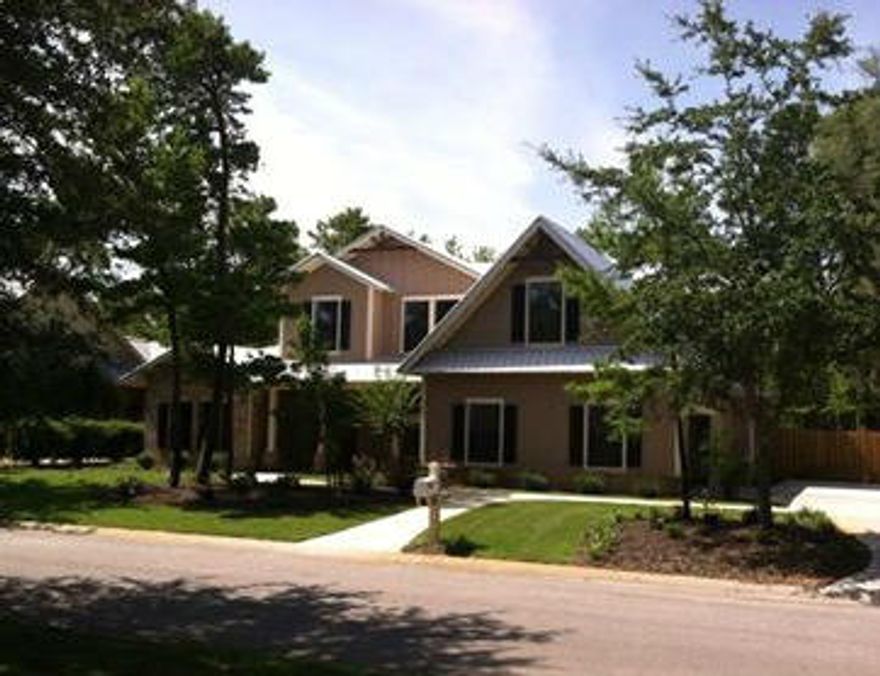 This amazing 4 bed/3 bath home is located in Botany Bayou. It is a custom built home completed in 2013 that is perfect for entertaining. From the minute you walk in the front door the house has an exceptional flow. You are greeted in the foyer with a gorgeous staircase, hardwood floors and a 12 light chandelier. The dining room has a stunning double tray ceiling. Custom cabinets, granite counter tops and stainless steel appliances are just a few of the features that the kitchen offers. The family room has 20 ft ceilings that are open to the second floor, stained concrete floors and a brick wall that adds character. The master suite and bath are on the first floor as well as an additional bed and bath. On the second floor you will find two sizeable bedrooms, a bath and bonus room.