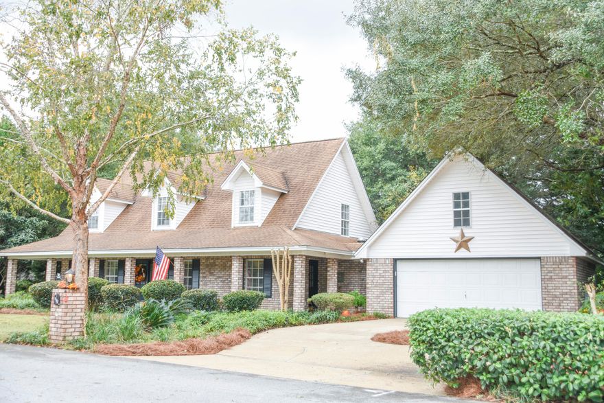 One of a kind, custom built home in South Crestview! This could easily be converted into a four bedroom since there is a den, office and a great room, plus a loft upstairs. This home has had many high quality upgrades. Newer custom kitchen, newer Rudd HVAC system, 19 foot cathedral ceiling in the great room with a wood burning fireplace, wood and tiled floors, crown moldings and many custom touches. This 2 story home has so much character with a wrap-around country porch, brick exterior and lush landscaping. Inside there are many separate living areas. There is a media/ game room, a private office overlooking the back yard, a loft for the kids or grand kids upstairs between the 2 bedrooms. The Seller will Credit $5,000 toward buyer's closing costs at closing !