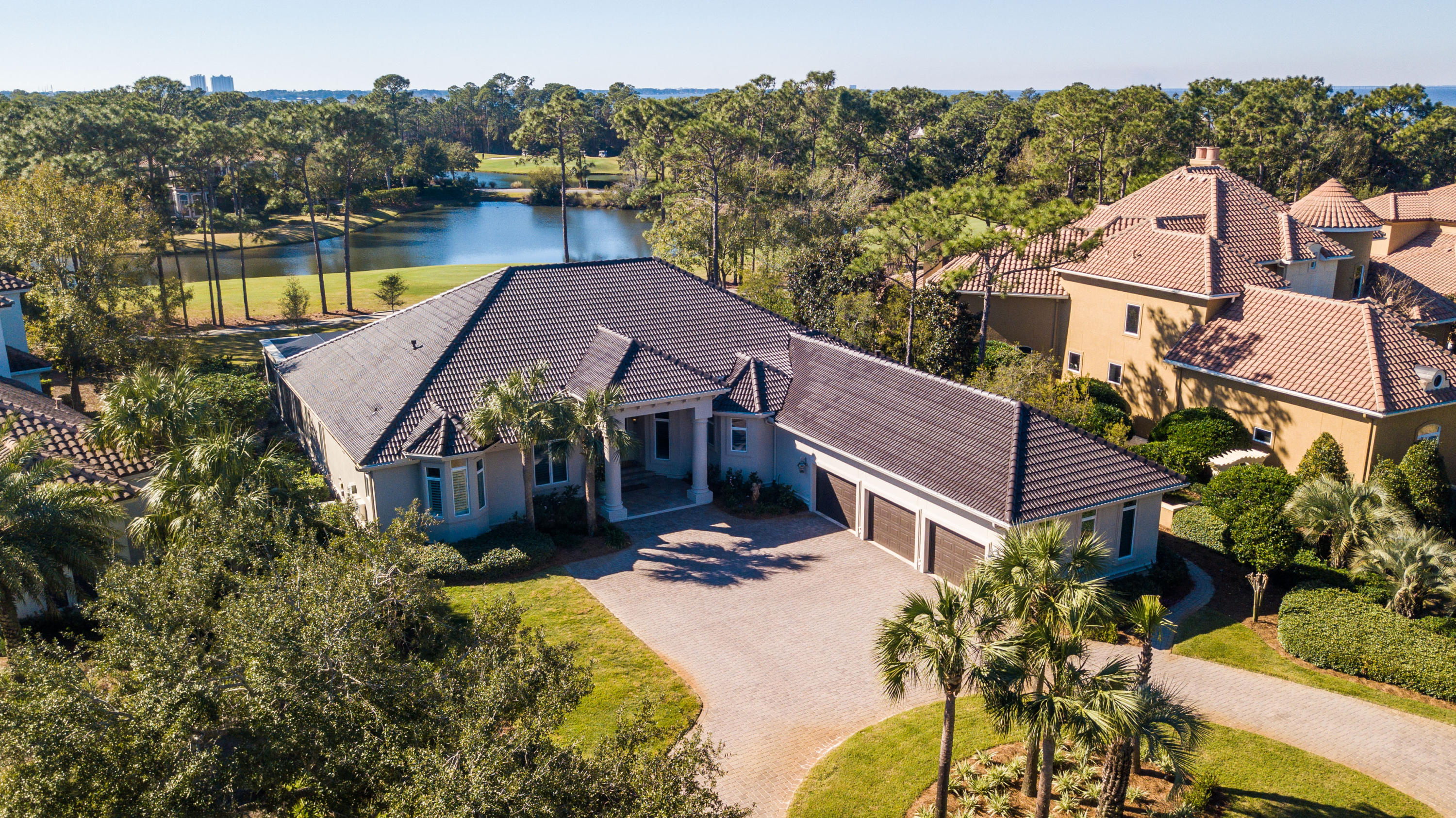 A unique opportunity rarely available in Burnt Pine... 4 Bedrooms, 4 Full Baths, all on ONE LEVEL, located on the 17th Fairway of the Burnt Pine Golf Course. Perfectly situated on a private cul-de-sac street with very little traffic. An estate sized home on an estate sized lot with tranquil views of the golf course and lake. Incredibly spacious, open floor plan, with ample room for entertaining. This home has everything one would expect in a Burnt Pine home, including a screened lanai and pool. The sleek kitchen is sure to impress and features an abundance of cabinets.Split bedroom floor plan provides privacy for the master suite as well as guest suites. Separate study with french door entry way and beautiful built in cabinetry. The large circular drive offers easy access in and out.