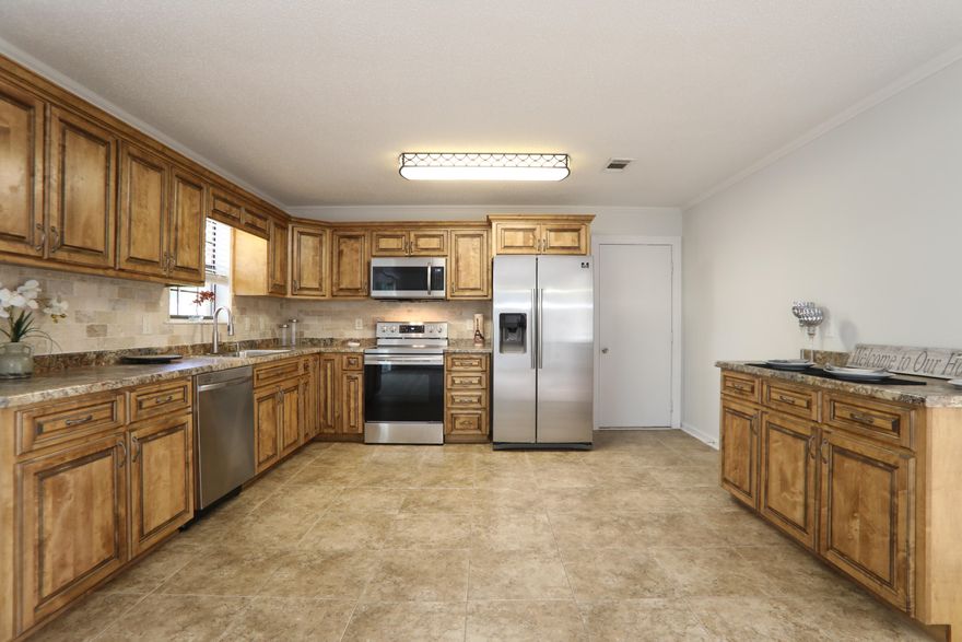 Few Details being done and will be 100% ready by Friday 3/27/2020..... New Pictures soon!! Getting few detail over next days --This home is in perfect condition and has been totally remodeled.. Brick Home 3/2/1 on 1 acre and 1827 Feet...2009: Exterior HVAC unit 2010:New metal roof. 2012:New custom bathrooms, new well pump, new custom kitchen with hand made cabinets, new appliances and new flooring throughout. 2015:Interior HVAC unit...