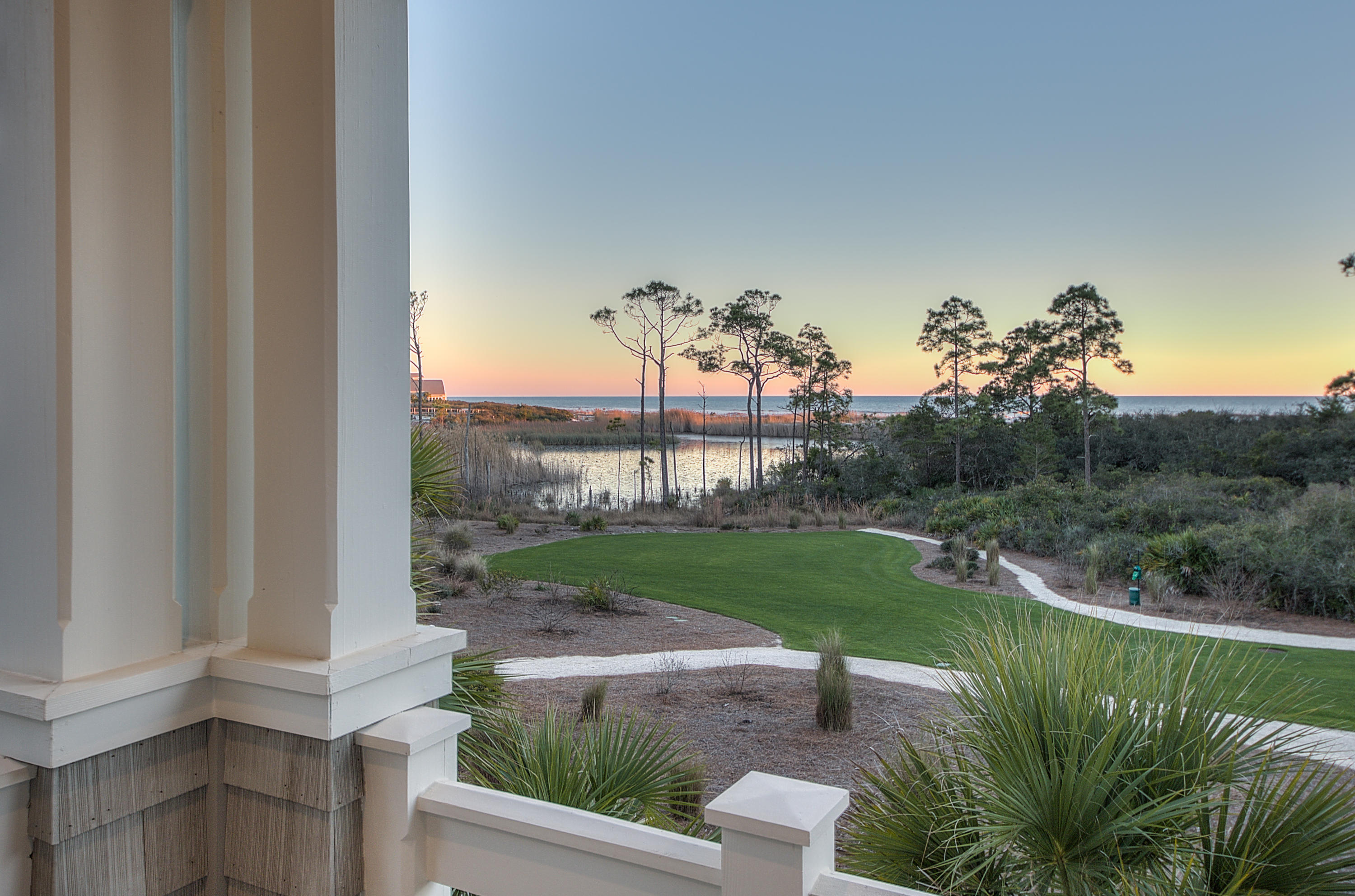 This Watersound Beach address radiates style, tranquility and exquisite taste. The soft hues of the impeccably decorated interior are accented with reclaimed oak hardwood floors, wrought iron stair case and chandeliers and a gorgeous, peaked and beamed cathedral ceiling in the dining area and living room. Perfect for entertaining, the large kitchen center island with gleaming Dacor stainless steel appliances make this an exquisite place to host family and friends. The expansive elegance of the great room concept raises the bar for amicable hospitality in stunning style. The home's delight only continues in its outdoor space, complete with large heated pool with fountains and copious room to relax in the sun.