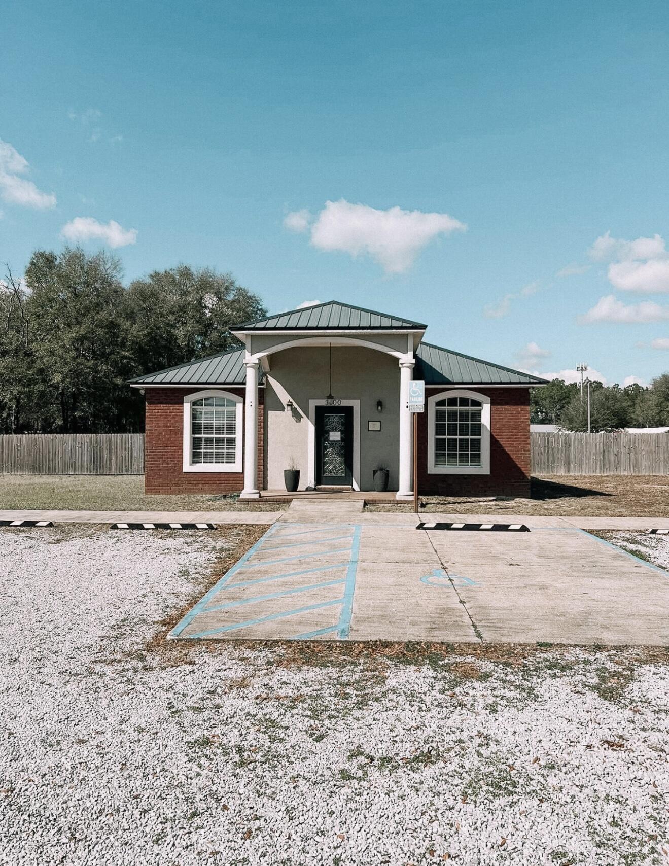 Don't miss this rare opportunity to own a highly visible MIXED USE / COMMERCIAL property right on Highway 85 in rapidly growing North Crestview. Situated on over half an acre, this income-producing property offers endless potential for business owners and investors alike.Originally designed as a full-service salon, the building is already plumbed for sinks, equipped with abundant electrical outlets, and features a built-in central vacuum system. It also includes washer/dryer hookups and has been updated to meet Florida salon standards, making it ideal for salon owners, boutique shops, or other service-oriented businesses.Currently used as a rental office space, this property is already generating income while offering tremendous upside and equity.