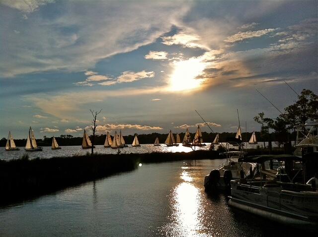 Beautiful Bay Views... watch the sunset every evening from your back porch. Bluewater Marina, Schooners Oyster bar and restaurant just a quick stroll away.Beautifully updated with LVP flooring throughout, granite counter tops. Owner has had the crawl space sealed and added 2 de-humidifier's, one in the crawlspace and one in the house. Come take a look and you wont be disappointed!