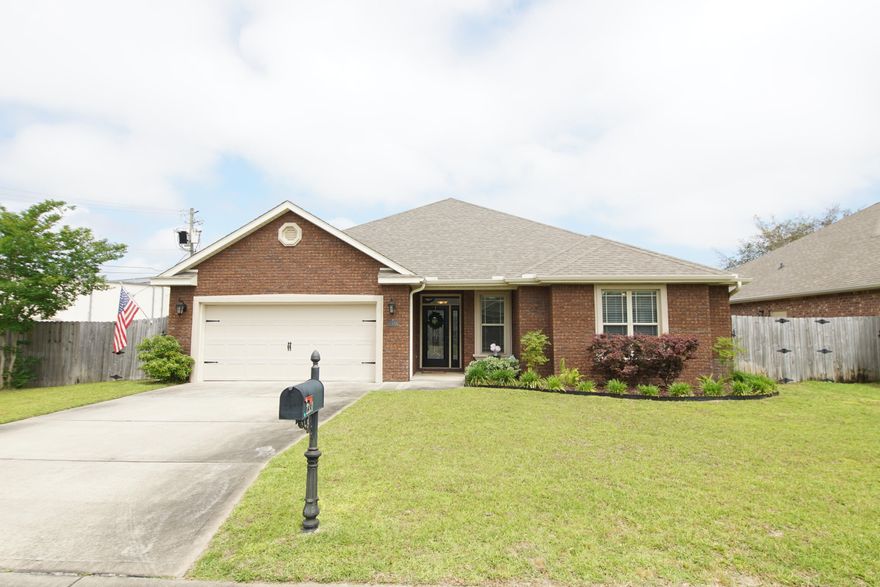 Welcome Home!  This fabulous Watree built home located in Fort Walton Beach is the perfect home for your family.  The Majestic Oaks neighborhood is also located adjacent to the County's new Stillwell Park with lots of open green space, a walking / jogging path, picnic tables and a basketball court. Enter the large foyer and you will instantly feel the warmth of this home.  The entire home has hard wood floors through out, coffered trey ceilings in both the living room and master bedroom, a chef's dream kitchen and a split bedroom floor plan. The large master suite has a gorgeous ensuite bathroom with his and her closets.  On the other side is three bedrooms with one of them having it's own private bathroom.  The outdoor living space is tranquil and private with lush, mature landscaping.