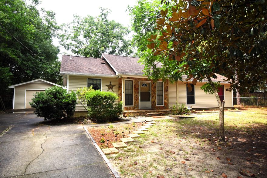 Charming 3 bedroom and 2 bathroom home located near shopping, schools and bases. Situated on a large lot that is completely fenced in.  Home has over 1100 square feet. Kitchen comes complete with all appliances, including refrigerator, washer and dryer. Great rental investment potential or would be a great starter home.  Large family room with wood flooring. Bedrooms also have wood flooring, no carpet here. Kitchen and bathrooms have tile flooring. Laundry room is located just off the kitchen. There is a large 1-car detached garage with a lawn door that opens into the back yard. Seller is offering a home warranty with Old Republic up to $570. Don't let this home pass you by. Give me a call today to view this home.