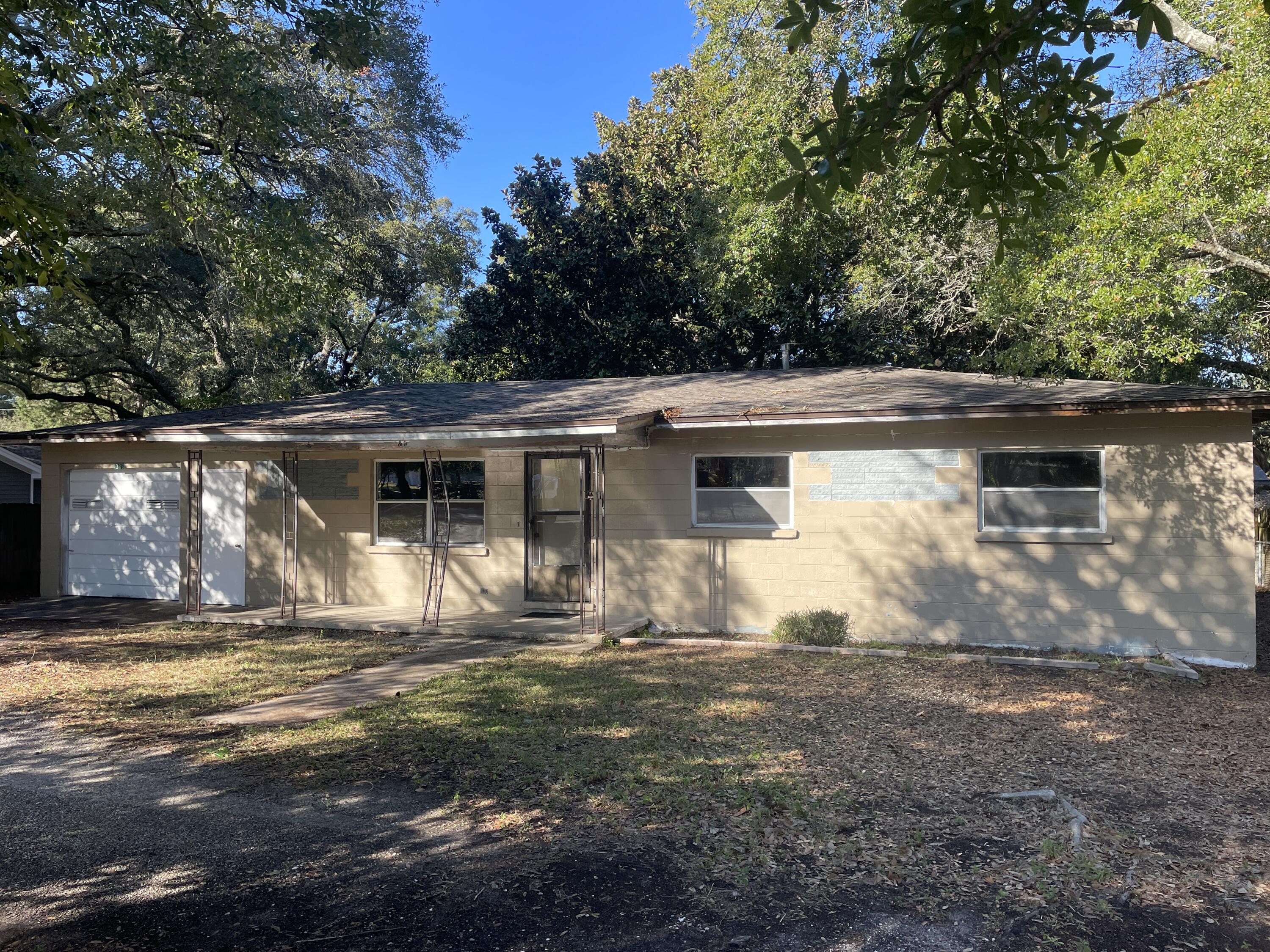 AMAZING opportunity to steal this Ft. Walton Beach home for under $200K! WOW! Located in the heart of Ft. Walton Beach, this 3 Bedroom / 1 Bathroom home is in the center of everything the city has to offer. It's the perfect opportunity for you to put in some elbow grease and end up with a stellar property and a ton of equity! HUGE fenced-in backyard with a giant aged Magnolia tree - Gorgeous! Great bones and foundation - This property is perfect for the 'do-it-yourselfer' or a quick flip! Don't wait because at this price it definitely WILL NOT LAST LONG!