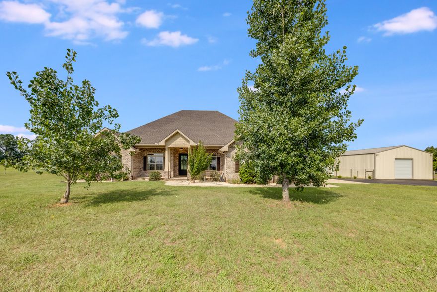 Discover the perfect blend of space, privacy, and modern comfort with this beautiful 4-bedroom, 4-bathroom custom built home set on an expansive 22-acre property! This charming country estate offers serene views, open skies, and endless potential for outdoor living, recreation, or agricultural use.The home features a welcoming front porch, ideal for relaxing evenings or morning coffee while enjoying the peaceful surroundings. Inside, you'll find a spacious layout designed for both comfort and function, with generously sized bedrooms, multiple living areas, and abundant natural light. The kitchen is well-equipped for family meals or entertaining guests, and each bathroom is tastefully appointed for modern living. (Continued) Step outside to enjoy wide-open acreage perfect for horses, farming, or simply soaking in the rural beauty. Whether you're looking to create your dream homestead or enjoy quiet country living with plenty of room to grow, this property offers a rare opportunity.

Additional property features include a 11.5'x10' safe room/ storm bunker complete with concrete walls, steel reinforced rebar and concrete roof as well as a 300mph blast proof door! The 30'x48' workshop has concrete flooring, power, and 2 roll-ups doors - perfect for all of your toys!

Don't miss out on this slice of Florida paradise- schedule your private tour today!
