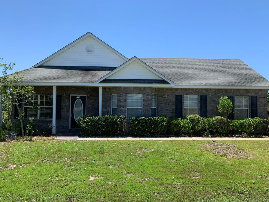 Coming Soon!  Great house in Freeport, quiet family friendly neighborhood conveniently located just off Hwy 331. This 3 Bedroom 2 full bath has over 1550 Sq. Ft. Custom stonework throughout the house.  Upgraded kitchen has granite countertops, travertine flooring and marble backsplash. 14' celling living room with marble fireplace is open to dining room overlooking three panoramic windows. Two big guest bedrooms with closets are adjoined by guest bathroom fitted with beautiful stone countertops and flooring. Oversized Master Bedroom featuring sitting area, walk-in closet, second closet, travertine flooring and marble bathroom with double vanity with granite counter, separate shower and garden tub.   Property is situated on large, oversized corner lot with fence.
