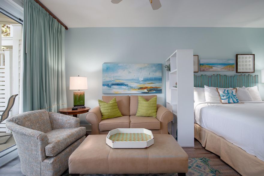 All the hype about tiny house living focuses on embracing a small footprint where opulent real estate is not necessary for a quality lifestyle. There may be no better illustration of this concept than in this ground floor studio condo. In a lovely, designer decorated space with a king bed, cozy living room, dining nook, full bathroom and kitchen basics. You'll have your own private retreat with a world of resort-class amenities just beyond your patio. You don't need to own a big outdoor kitchen, BBQ grill, fire pit, entertaining space at owners only Solstice Club, swimming pool, fitness equipment, tennis courts or a kayak. It's all here within the 2,400-acre resort property.This unit comes turnkey, fully furnished with new flooring, a stylish interior and charming decorative accent