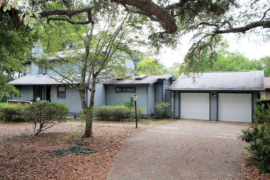 Fantastic opportunity to purchase a 4 bedroom, 2.5 Bath on the 4th hole of the Lake Course in the highly desired community of Bluewater Bay. This home is in good shape, but needs some updating. The home is complimented with large master bedroom with two walk-in closets, formal dining room, wood burning fireplace, large additional bedrooms, mature trees, circular driveway and Florida Room with incredible views of the golf course and lake.