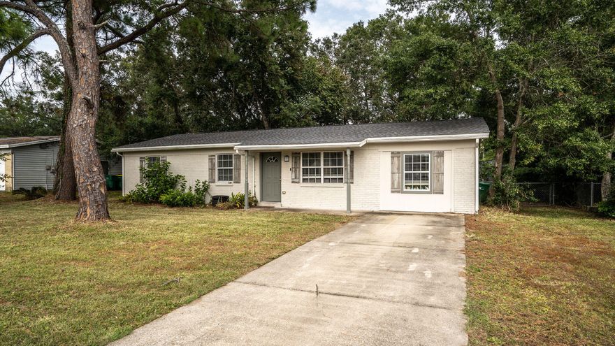Cute ranch, ready for you to move in! Kitchen and living room are open concept with a bonus den that has a fireplace and pocket doors for privacy if needed. Home has great natural light, stainless steel appliances, granite countertops and white cabinets. Enjoy a fenced backyard with mature trees and a concrete patio for entertaining and enjoying the outdoors. Backyard also has a storage shed for all lawn tools. Home is located central to many great amenities to include Hurlburt Field, shopping, restaurants and of course stunning beaches.