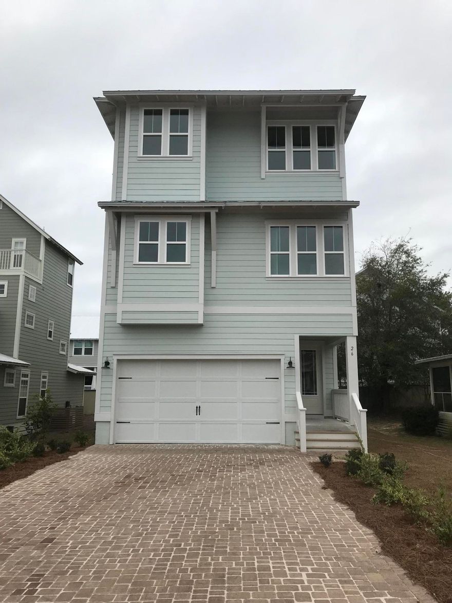 Grande Pointe offers Florida living at its finest...from the moment you enter this beautiful subdivision, you feel like home. Tree lined streets, resort style pool, and a picturesque dock help to make this one more reason that you want to come home.This 3 Story home come standard with an elevator!! Balcony's grace each level of this home, ample storage space throughout the home and hardwood floors on the first, 2nd and hallway of the 3rd floor.The Master bathroom boasts granite counter tops, separate tub and shower, along with a nice walk in closet and huge linen closet. The flex space on the first floor can also be used as a bedroom, giving it a 4th bedroom option. There is a full bathroom on the first floor along with plenty of closet space.