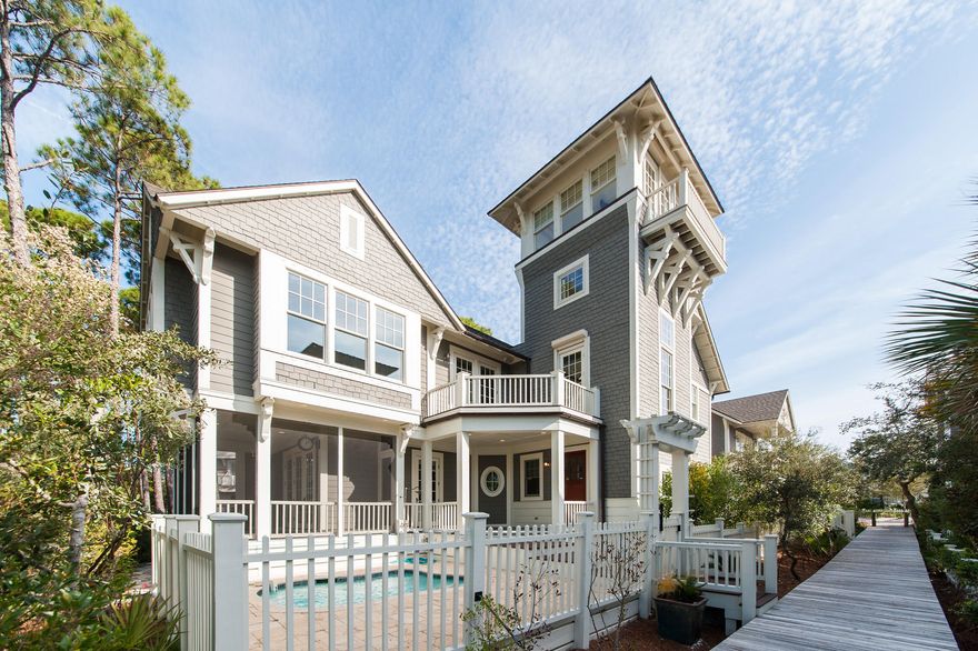 Prime location in Phase One of WaterSound Beach. This large coastal home offers a detached carriage house above garage & private pool, designed to sleep many and command high vacation rental income of +$96,000 per year! Mahogany-stained doors provide front & rear entrances. The 10' ceilings give a wide-open sense of space. Two master bedrooms with en-suite baths & custom closets, two guest bedrooms, an office area, & a full-sized laundry room in the main house as well as living, dining & kitchen areas. The second floor deck reveals exceptional views. Impressive views of the Gulf convey from the 3rd level decks. Carriage House is above garage. Strong rental income potential. See attached pro for