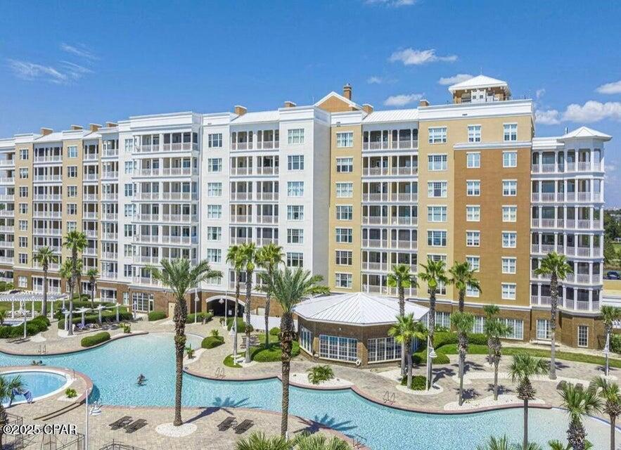 Seller shall pay $12,500 for Reflections HOA, to be either prepaid or credited to Buyer at closing! You don't want to miss this 4th floor beauty at Reflections! This an extraordinary opportunity to experience the ultimate in resort-style living! Offering luxury resort vibes with incredible water views and top-tier amenities. Enjoy the hot tub, heated pool, grills, fire pits, an owner's lounge, and Serenity Spa on-site. Security cameras are strategically placed throughout the community for peace of mind. The unit comes all NEW living area furnishings as well as dining furniture and accessories. Beautiful seating and decor, perfect for family and guests., The master bedroom and bath boast a stunning walk-in shower with a his-and-hers vanity. The kitchen is equipped with Frigidaire stainless steel appliances, installed just two years ago, and LVP and tile floors run throughout the condo. Meticulously maintained and ready for immediate occupancy, this unit offers the perfect blend of comfort and style. Short-term rentals are allowed, making it an ideal investment property or permanent home. Situated near golf, jet ski rentals, and restaurants. It's a prime location.