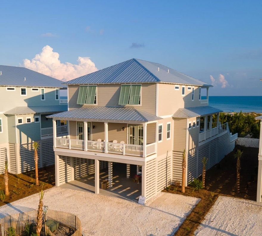 New 2023 Construction! Elevated Pool With Oceanfront Views!With two large decks overlooking the Gulf, your own private pool, and the sugar sand beach and clear blue water just feet away, Amalfi Beach House is the perfect vacation spot in the Villa del Sol subdivision. This 3,300 square foot 5 bedroom 5 bath vacation home owned by Bella Coastal Rentals with an elevated pool and elevator was built in 2023 in a lovely private gated subdivision.Amalfi truly captures the essence of all things coastal. You will be greeted with a large, open concept living and kitchen space boasting spectacular Gulf views. Take a step through the back doors facing the ocean to find yourself in the peaceful, breezy surroundings with an amazing, unhindered view of the Gulf and your own private elevated swimming pool. Back inside, the dining and kitchen area has beautiful hardwood floors, modern amenities, and a kitchen featuring a large island, appliances, and quartz countertops. The comfortable, roomy living space is the ultimate gathering spot for entertaining and making memories with friends and family.

The first floor has a 1 bay view master suite with a king bed and attached private bathroom along with a bay view master bedroom with king bed. On the second floor, there are two Oceanfront master suite bedrooms with king beds and attached bathrooms, and a charming bunk room with 3 bunks and a full bathroom. The most inviting aspect of the second floor is that two of the bedrooms have access to its large deck overlooking the Gulf, while the bunk room has views of the bay.

Walk down your own boardwalk from your coastal home and you'll find yourself on the miles and miles of sugar-white sand and pristine blue water of the Gulf of Mexico. Whether you enjoy combing the beach for shells, snorkeling, kayaking, sunbathing, surfing waves, fishing, or taking a leisurely stroll or horseback rides along the shoreline, you'll spend hours of fun while soaking up the sun. Venture out to enjoy shopping, galleries, entertainment, and restaurants in the quaint downtown of Port St. Joe located only 15 minutes away. Visit the historic lighthouse, visit the shops, have lunch or dinner, or take the ferry over to St. Vincent Island for the day. For the fishing enthusiast, launch your boat at the nearby Indian Pass boat ramp and take in some first-class fishing, or book your family on a fishing charter for a day trip out on the water to catch your dinner for the night. When you want to experience the beauty of St. Joseph Bay, visit nearby Salinas Park with a playground, picnic table, fire pit, and boardwalk over the serene water. You can even get in some exercise by walking, running, or biking on the 19-mile paved trail. About 25 miles away is the quaint, historical, fishing community of Apalachicola. Apalach is perfect for a day trip to do a little shopping, stroll along the Apalachicola River, or grab some of the best seafood around!
The Space
Ground Floor
 " Parking for 5 vehicles in driveway
 " Elevator
 " Ice Machine

First Floor
 " Living Room
 " Dining Room
 " Kitchen
 " Laundry Room
 " 1 Master Bedroom with King Bed and Deck with Bay Views
 " 1 Full Bathroom
 " 1 Master Suite with King Bed and Deck with Bay Views
 " Deck with Private Pool 

Second Floor
 " 2 Oceanfront Master Suites with King Beds and Deck and full Oceanfront views
 " 1 Bunk Room with 3 bunk beds - 2 bunk beds with Full over Queen mattresses and 1 bunk bed with twin over twin mattresses with an attached full bathroom with shower/tub

Neighborhood
Villa del Sol has Gulf and Bay views and is just steps to pet friendly beaches & St Joseph Bay. Neighborhood amenities include gated entrance, brick paved streets, boardwalk beach access, a community pool and two pickleball courts. Kayak & fish from the shoreline or walk the beach for seashells & wildlife. Visit nearby family friendly Salinas Park for pickleball courts & horseback riding or trek miles of paved walking & bike trails.
