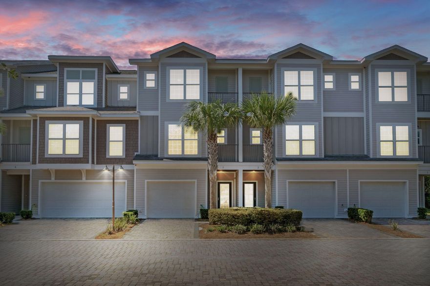 Liv - Salty at Driftwood Drive! This luxury 20-unit townhome-style complex in Miramar Beach comes fully furnished, presents 'as new', and meets the highest standards of quality and design. It is also only a quick 3-minute stroll to the beach and within reach of the world-renowned restaurant Pompano Joe's Seafood House. The first floor is laid with porcelain tile throughout, contains a comfortable bedroom with custom built-in bunks, a first-floor bathroom, and a backyard patio with pavers to make for a wonderful entertainment space. The one-car garage is completely insulated with a dehumidifier, is equipped with tiled flooring, and is also able to be easily converted into an extra bedroom. Ask about the video tour! Leading upstairs, the second and third floors contain natural oak hardwood floors and are enhanced by the area's 9-foot ceilings, 5-1/4" crown molding, and LED light bulbs throughout. The kitchen is amazing, it's fully equipped with a full array of stainless-steel appliances including a 2022 Frigidaire Gallery series refrigerator, 2022 Frigidaire Gallery series microwave, flat cooktop range, dishwasher. You'll also be sure to find ample storage space in a range of soft-close Arista Craft Brand cabinetry and the pantry sets. There is a communal wood dining table that is perfect for special occasions and celebrations and an outdoor balcony that is fantastic for light snacks and cold drinks. The amenities included are exciting  of course the beach is near, but there is also a community pool filled with features on Driftwood that can be seen from outside the additional bedroom on the second floor. Lastly, the master suite on the third floor is stunning. It is incredibly spacious and contains a vast walk-in closet, a large-scale shower space, and a modern garden soaking tub that you would have to see-to-believe. The exterior is comprised of fiber cement board sidings, PPG elastomeric paint coatings, and impact glass windows that are able to suppress objects up to 150 MPH. Sellers are selling home as a 1031 Tax Exchange. 