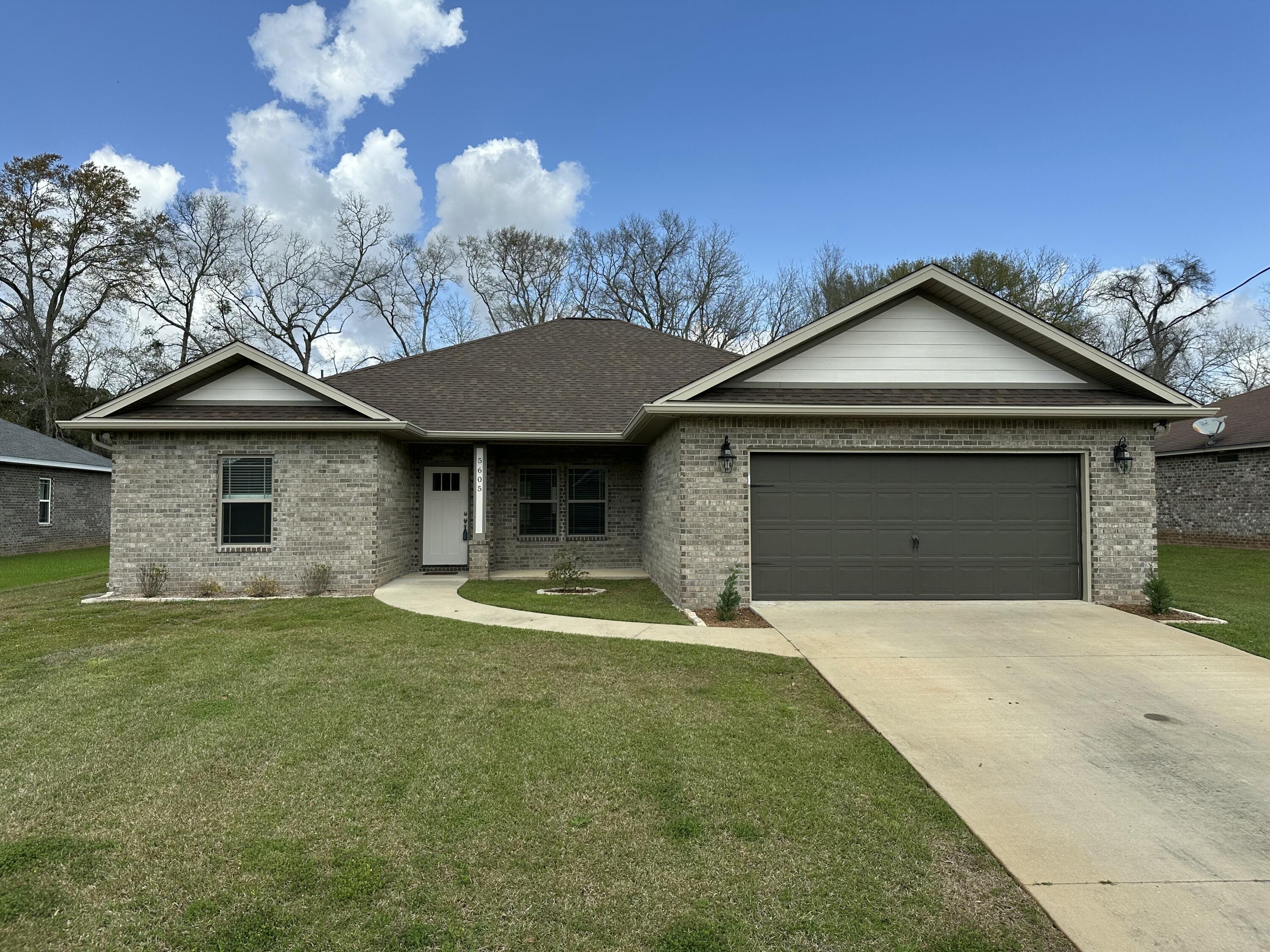 MOTIVATED SELLER! Seller is offering a rate buy down or all closing cost paid for! Your 1st year in monthly mortgage payment can be as low as $1811. Welcome to this magnificent 4-bedroom, 2-bathroom custom home built in 2021. Boasting a massive open floor plan, the kitchen is a chef's dream with gorgeous cabinets, granite countertops, a large deep sink with a tap faucet, a massive walk-in pantry, and quiet-close cabinets. This home is in pristine condition and loaded with upgrades! Enjoy the new luxury vinyl plank flooring, cordless blinds throughout, stainless steel appliances, and elegant crown molding. Each bathroom is equipped with beautiful cabinets, luxury vinyl plank flooring, and granite countertops. The master bathroom features a stunning walk-in tiled shower.