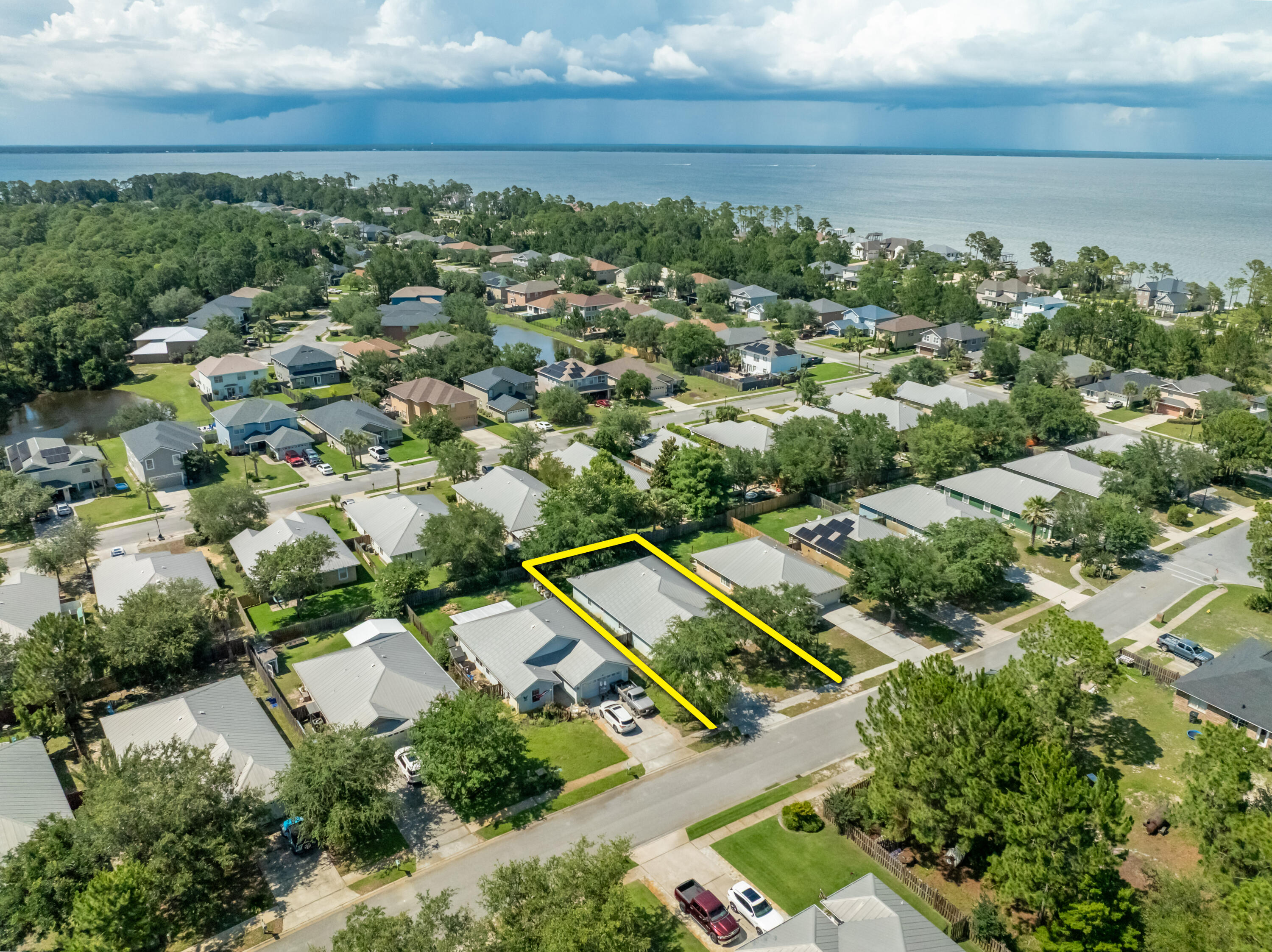 NEW LISTING! TLC SPECIAL! GREAT OPPORTUNITY! 48 S. Harborview Road is nestled in Santa Rosa Beach of South Walton County, Florida! This 4-bedroom, 2.5 bath home offers a practical floor plan yielding 1,825 square feet. Savor the surrounding nature, privacy, and the convenience of being centrally located to Scenic 30A, Miramar Beach, Destin, Fort Walton Beach, Niceville, Eglin Air Force Base, and Crestview. Appreciate the outdoor living and spacious backyard that is perfect for relaxing or hosting guests. Only a short car ride away from the coveted sugar-white sands of the Gulf of America, Choctawhatchee Bay, Sacred Heart Hospital, schools, dining, and shopping. Enjoy convenience and tranquility in one of South Walton's most desirable communities. A must see today!