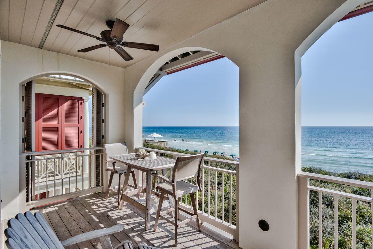 Nestled along the sugar white sands of Rosemary Beach, this elegantly updated Gulf-front home gifts its next owners with endless views of the Gulf of Mexico, only footsteps away. Idyllically crafted to provide a couture lifestyle experience within 30A's most desirable community, this five-bedroom Danish-inspired coastal retreat provides four ensuite bedrooms in the main house, while a stunning, freshly designed carriage house provides a luxurious space, complete with an upscale kitchenette, spacious sitting area and private, lofted bedroom for the ultimate convenience.The ground-level outdoor sitting area, second-floor grilling balcony, and the private master balcony on the third floor provide breathtaking vistas of the enchanting emerald green waters of the Gulf and provide additional