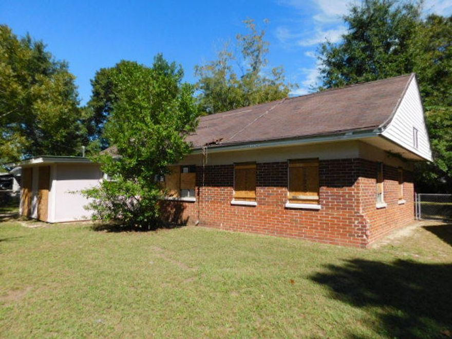 3 bedroom all brick home on quiet 1/4 acre lot! Close to all amenities! Huge covered patio in back with 2 outbuildings. A little work will bring BIG rewards in this North Hill neighborhood. Don't miss out on this opportunity!