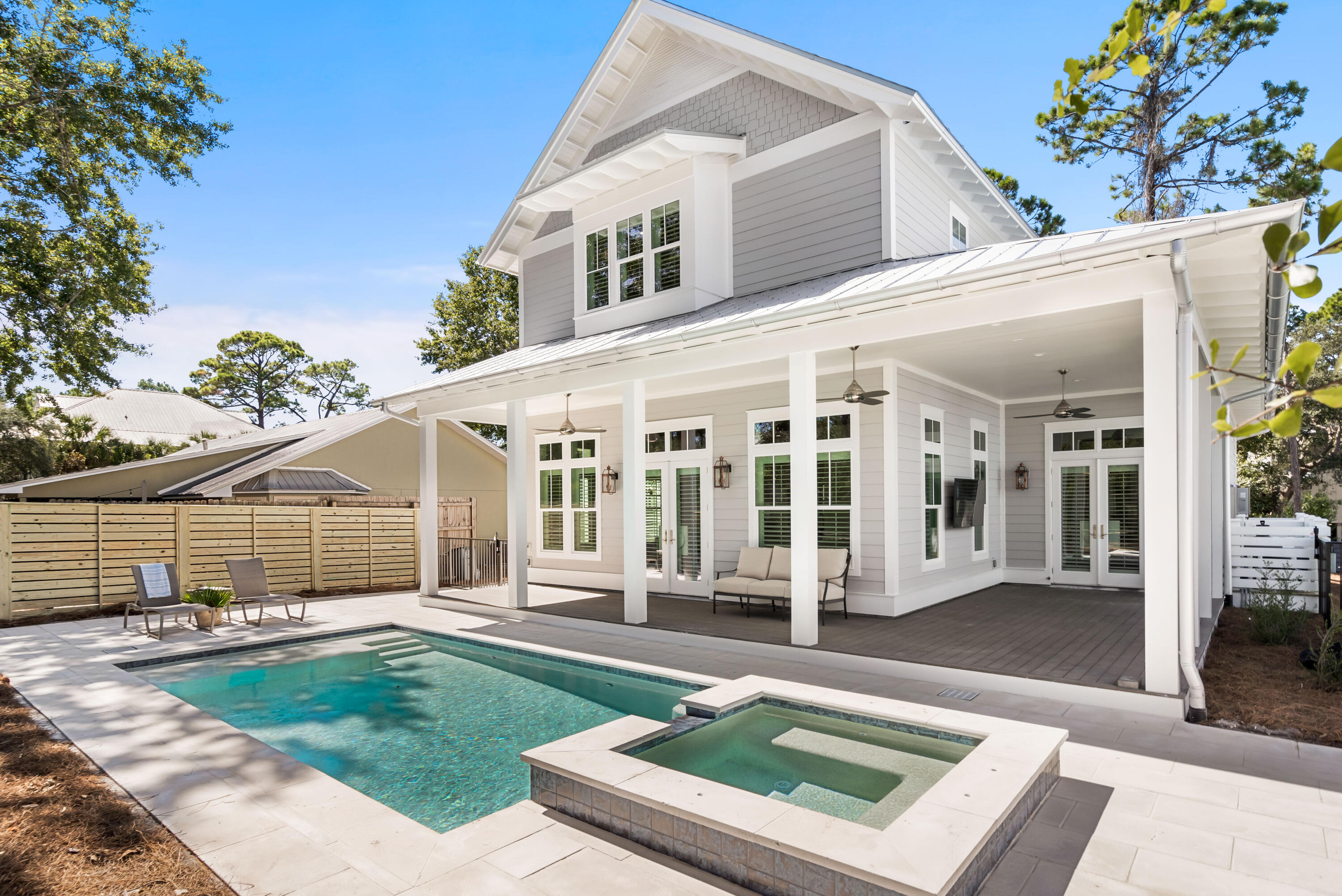 Salty Dog is a beautiful custom-built home in the quaint area of Seagrove. Nestled on a quiet street this home offers four bedrooms and four and a half baths. Well-appointed and tastefully decorated this home is cozy and inviting with comfortable furnishings throughout. An open floor plan provides flexibility, while additional outdoor living spaces are perfect for entertaining. One of two gorgeous master suites is easily accessible downstairs, as is the kitchen, which features high-end appliances, a butler's pantry, and a large island for morning coffee. Upstairs is another master suite, complete with a luxurious spa-inspired bathroom with a walk-in shower. Additionally, there is a bedroom with two more bedrooms, Both are spacious and welcoming, with private baths. Spend lazy evenings on the front or back porch or just float the stress away in the lavish pool and spa. The backyard is fully fenced for children to play and catch fireflies on a summer evening! The outdoor shower is a lovely added feature to help rinse the sand off before heading inside. With the Gulf of Mexico just minutes away, Eastern Lake across the street, and park access to the lake within a block, you'll find this the perfect location for outdoor enthusiasts. You'll find a host of delicious eateries nearby. Within walking distance you'll find Old Florida Fish House, Beach Bean Coffee, Buddy's Seafood Market and Coast Creamery. The Perfect Pig and Caf?? Thirty-A, both featuring fresh, local fare the whole family will enjoy are closely located too.