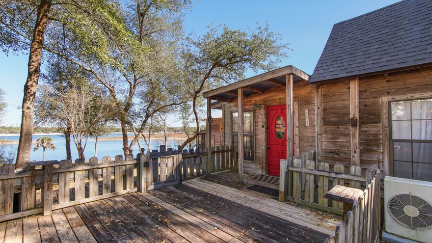 Lakefront living awaits at 932 Hammond Lake Drive, Fountain, FL 32438! Situated on 1.42 beautiful acres directly on Hammond Lake, this one-of-a-kind property offers serene waterfront views, peaceful privacy, and the natural beauty of Northwest Florida--all within a gated subdivision for added security and exclusivity.This distinctive home is filled with character and craftsmanship, featuring beautiful stained glass accents and warm wood floors throughout, creating a timeless and inviting atmosphere. The thoughtfully designed layout offers comfortable living spaces with large windows that frame picturesque lake views and bathe the interior in natural light.The master bath is truly a standout, boasting a custom round (silo-style) shower with a clear dome ceiling, allowing natural light to pour in while you enjoy a spa-like retreat. This unique architectural feature adds both elegance and intrigue to the space.
Outside, the property continues to impress with multiple outbuildings equipped with both electricity and water, offering endless possibilities for workshops, storage, hobby spaces, or guest accommodations. The barn area includes 30-amp service for an RV or camper, making it ideal for visitors or additional recreational use.
Spend your days fishing, kayaking, or simply relaxing by the water right from your own backyard. With over an acre of land, there's ample space for outdoor living, gardening, or future enhancements -all while enjoying the privacy and security of a gated lakefront community.
Whether you're seeking a full-time residence, weekend retreat, or waterfront investment, this exceptional property on Hammond Lake is a rare find. Schedule your showing today and experience this truly special lakeside lifestyle!