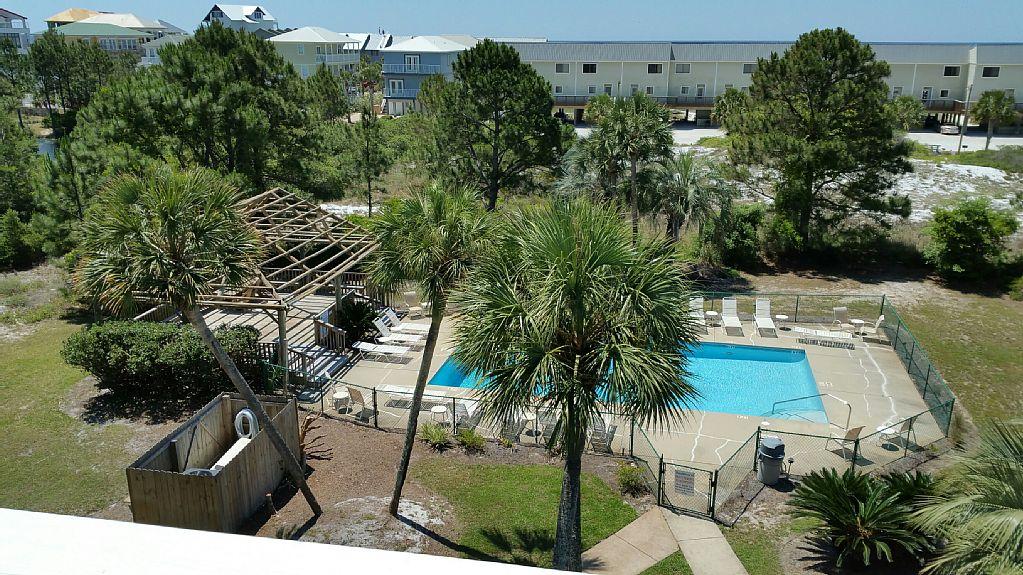Looking for a great buy under $200,000 right by the beach, this is it. This unit is located on the top floor (building has an elevator)offers views and is 2 stories. The property has been very well maintained and has excellent rental income. The space is well laid out, high ceilings, loft style bedroom, washer and drye, a nice sized balcony with VIEWS and comes furnished