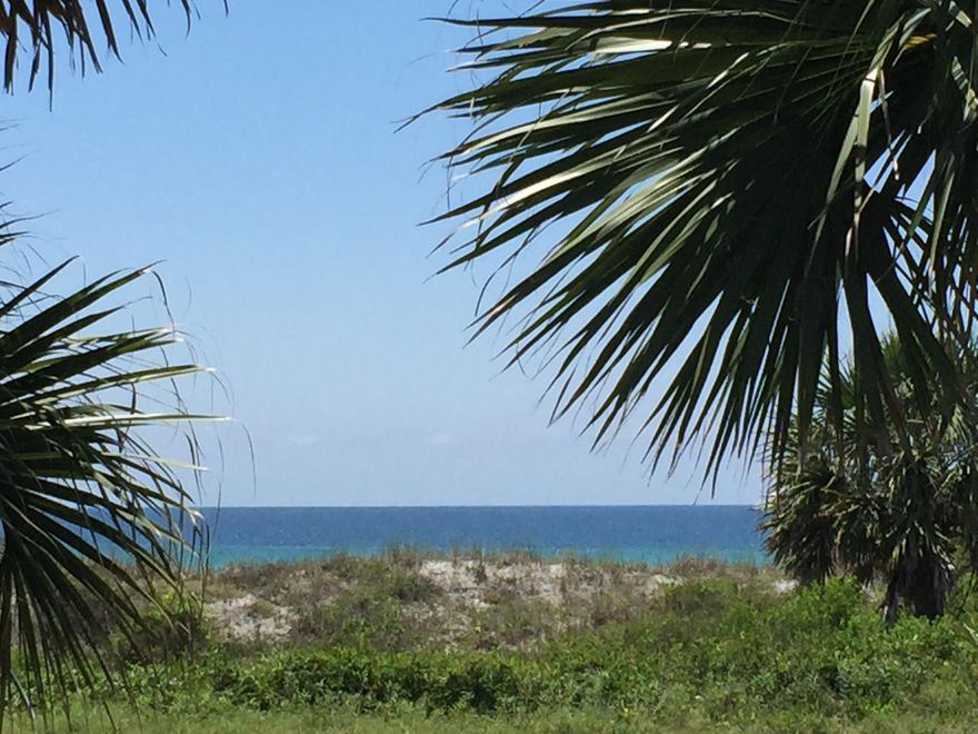 RARE OPPORTUNITY! 50' x 153' vacant lot and adjoining 50' x 77' lot with 2 Bedroom, 2 Bath Cottage that has been fully renovated and furnished. Here is your chance to capture GULF VIEWS with INCREDIBLE RENTAL POSSIBILITIES. Property zoned C-1. 50' height allowed. Build your dream home and have a guest cottage or Mother-In-Law cottage ready to go or build your own little ''Rental Compound''. ADJACENT COTTAGE with 3 bedrooms, 2 baths and Gulf View also available. (MLS #748758) With the purchase of all you can own 100'x 153' of INCREDIBLE GULF VIEW directly across the street from dedicated beach with (2) Rental Ready Cottages and room to build more!! THIS IS AN INVESTOR'S DREAM!