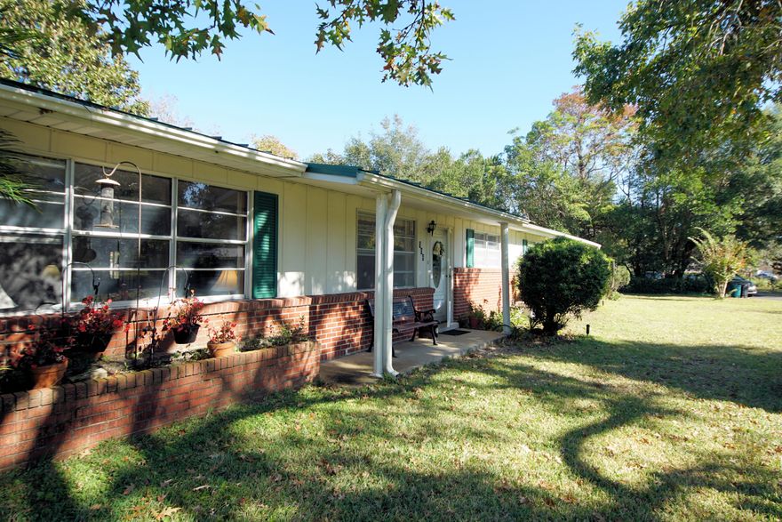 What a Wonderful Place to Call Home! Immaculate All Brick on a Beautiful Tree Shaded Corner Lot with Room to Spread Out! And a Metal Roof!! This Well Loved Home has 2 Living Areas and an Inside Laundry. Massive Family Room leads to Screened Back Porch and Fenced Yard. FOUR Bedrooms. Owner Suite is HUGE and has a door to the Backyard. Add A Pool or Hot Tub. Additional Rooms are all Great Sized along with a Continental Bathroom with 2 toilet, 2 sinks and a tub/shower combo. Kitchen has an Eat-In Area and view of the Beautiful Backyard. 3 Yard Buildings with power to 2. One Shed is a Fabulous Workshop! Original Parquet Wood Floor under the Berber Carpet would be lovely re-stained or buffed! This is a Fantastic Opportunity for Anyone Looking for a Spacious HOME! SEE MORE!!! HVAC is approx 1 yr old 
METAL ROOF!
Seller JUST renewed Ins at $1700 month with Universal
Brand New Electrical Panel / Breaker Box
Rewire to box was done by Cochran Electric

Buyer to verify all measurements and pertinent information