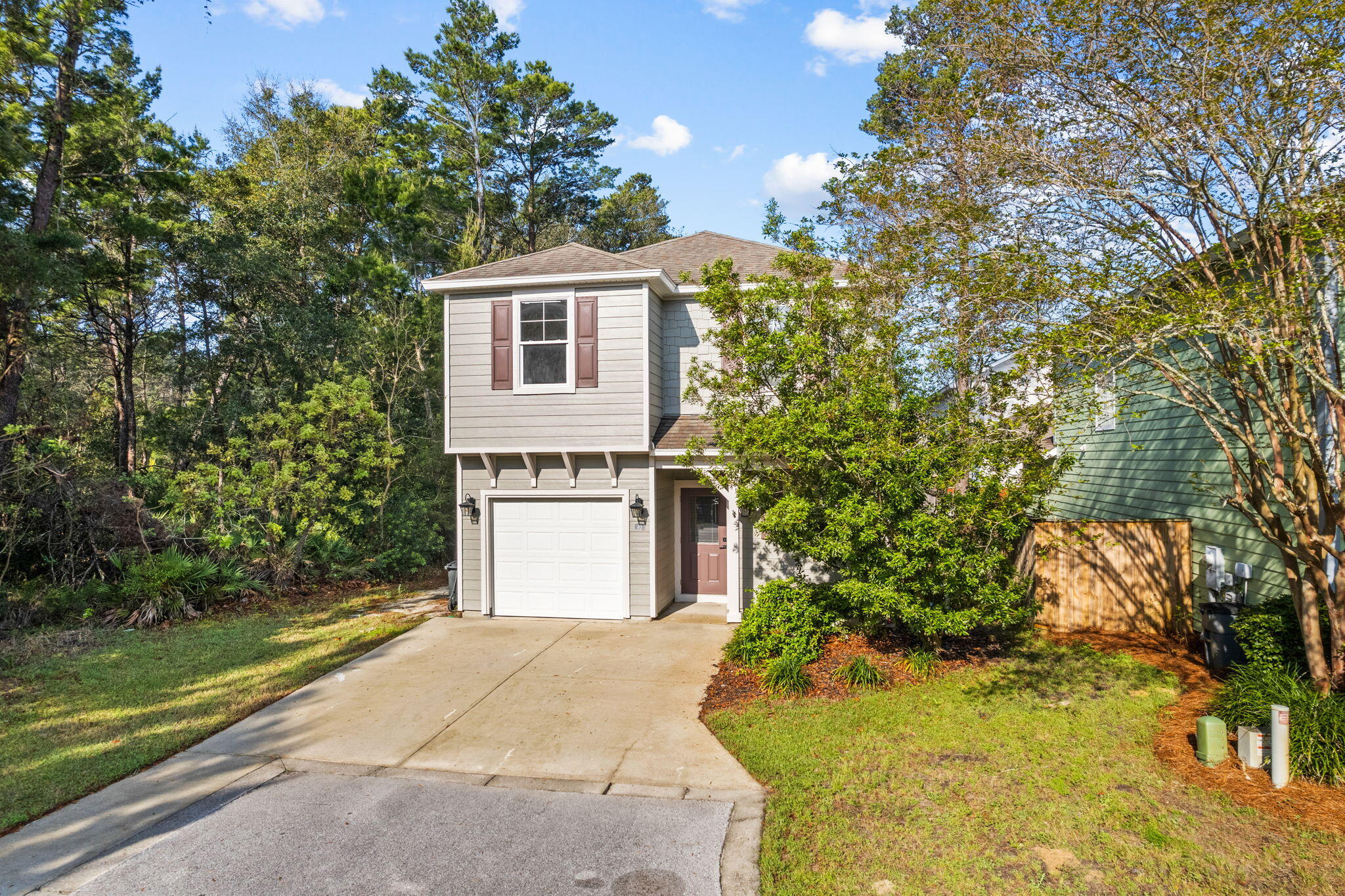 Welcome to 40 Myrtle Oak Way in Santa Rosa Beach! This meticulously maintained 3-bed, 2.5-bath end-lot home offers 1,351 sq. ft. of stylish living space with added privacy. Fully furnished and move-in ready, it features fresh interior and exterior paint, luxury vinyl plank flooring, and a professionally designed interior. The kitchen boasts stainless steel appliances and granite countertops, while the backyard includes a kid-friendly playground--perfect for families! Don't miss this prime opportunity in a desirable location. Schedule your tour today!