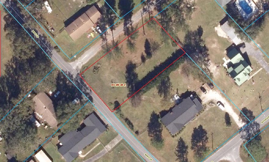 .4562 acre CORNER lot. Cleared. Public water and sewer taps fees due.   See photos for information PER the COUNTY for soils, flood zone , which is X, zoning, topo, No wetlands PER GIS map, no study has been conducted. The parcel is in the Town's limits.Century doesn't have zoning, but it is in the Low Density Residential Future Land Use District. That means that it could be used residentially up to 4 dwellings per acre. Not able to divide it into two buildable lots. Setbacks are 5 feet from the back and side property lines and 34' from the center of Baptist Church Rd and Mayo LN. They are both city roads.