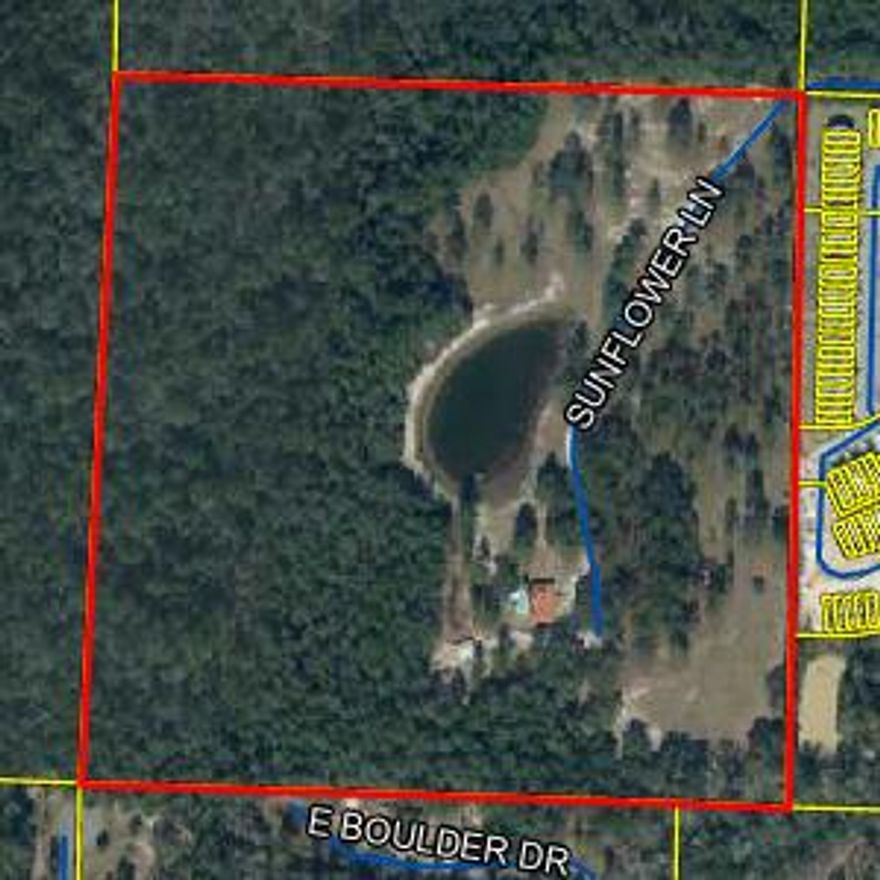Unique property located in the heart of the growing city of Freeport Florida. Freeport is growing exponentially. The property has great potential for developers looking to invest for a future subdivision. The property resides in the heart of the city and is a hidden gem. There is a creek that flows on the property. A pond is within eyesight of the home. Property has a 200-yard range. Whether used as an investment property, or a large, secluded parcel of land for a more private setting, this property is sure to please.
