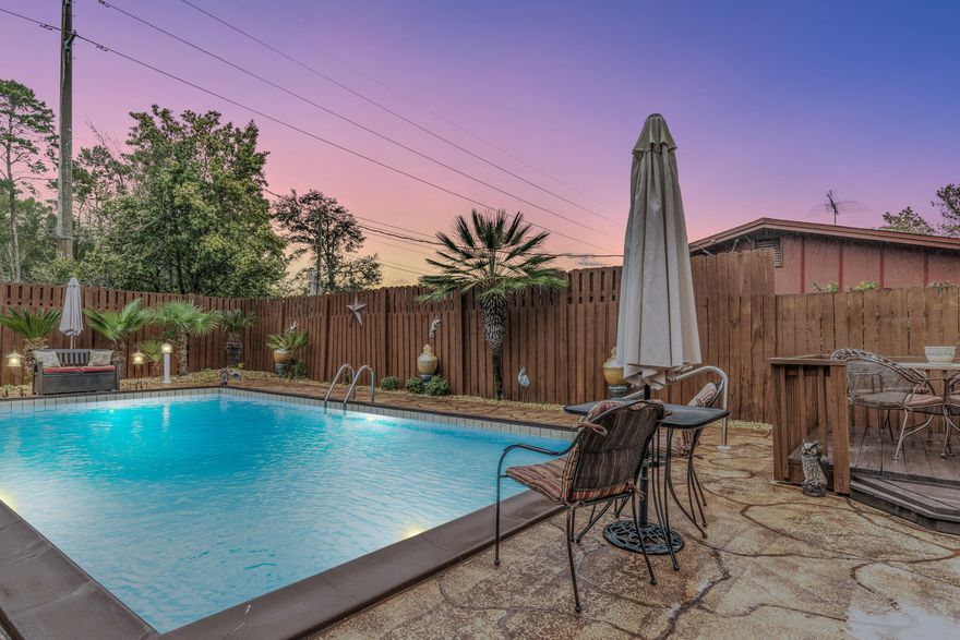 Step inside to a beautiful home that is fully renovated, highly upgraded. 3 bedrooms, 2 bathrooms with an office that is complete with a security system that monitors all areas around your home, your own private pool and tons of space and storage! The kitchen is tiled, along with the counter tops, the backsplash is custom with a design of mirror and tile. Large living room comes off of an office that overlooks the pool. The huge master has a barn door that walks you into the beautiful master bathroom. Excellent entertaining area in the backyard with a pool and tiki bar with speakers. The lush landscaping is low maintenance and has over $7K in LED outdoor lighting upgrades. Super energy efficient home. There is so much more upgrades but you have to see it to believe it!