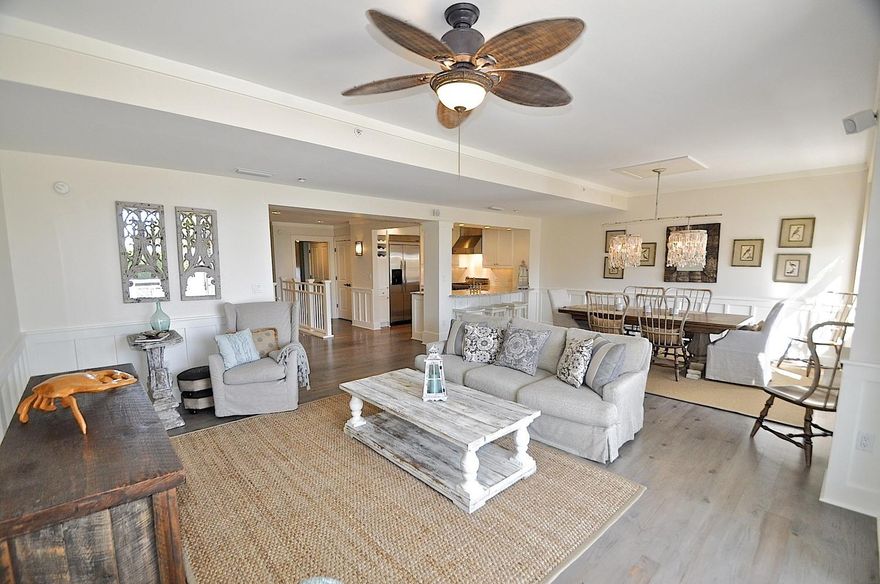 Beach front with beautiful gulf views and over looking the large community pool. New renovations include: Kitchen, Master Bedroom, Master Bath, Bunk Room, Half Bath & custom hardwood flooring through out . This end unit townhouse style home is spacious with a large home office and attached garage. This home has lots of storage and could be used as a full-time home, second home or rental home. Watersound is a 256 private gated community with a mile of deeded beach on the Gulf of Mexico. Beach Club Member available!