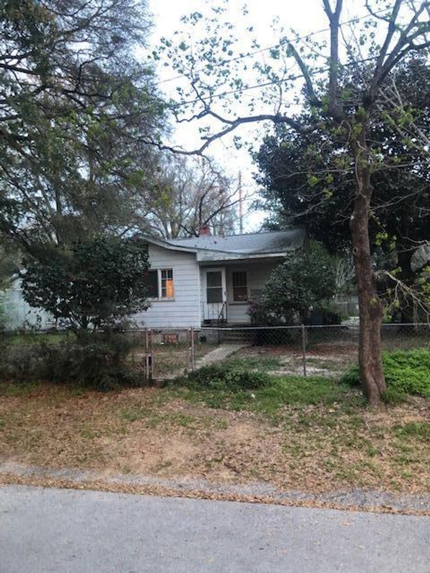 Close to park, military bases, schools and shopping. This 3 bed/ 1 bath home sits on a corner lot. Home needs work~ lots of potential.