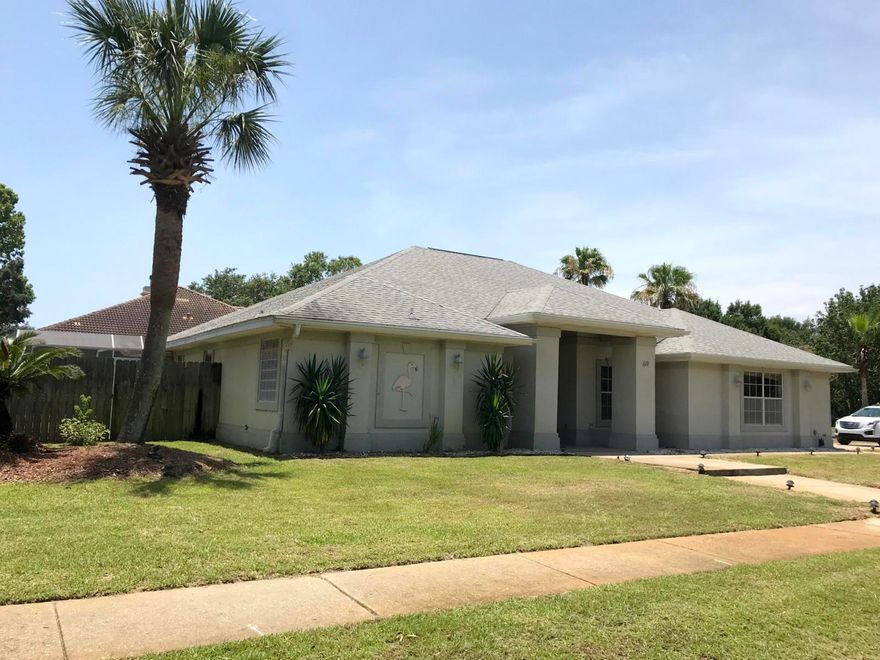 Don't miss this opportunity property in desirable Indian Bayou Country Club. Sitting on a spacious corner lot, this home gives the best of Florida's outdoor living with a screened pool, covered patio, and fenced backyard. The home features a side load garage, formal dining area, kitchen overlooking the large living area, and plenty of storage. The master suite features an oversized walk-in closet, dual vanities, garden tub, separate shower, and tons of natural light. Indian Bayou is close to the bay, Gulf of Mexico, Destin harbor, and the sugar white beaches that the Emerald Coast is famous for. Call your agent today. - Home is sold as is.
