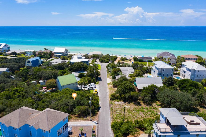 Build your beach home on this large vacant parcel in Blue Mountain Beach, steps away from a deeded beach access at the end of the road. Gulf views possible with a multi-level home. This property is dry, flat, and at a high elevation. The size is 75' x 150' just over a quarter acre. No HOA dues or buildout times. This lot is West facing, which provides the ability to watch the beautiful sunsets. You will also enjoy the sounds of the waves crashing from your own home. Blue Mountain Beach is a charming area and very popular for full time residents, second homes, and income producing properties. Grayton state park is nearby containing miles of trails for biking and hiking. The great new restaurant, Blue Mabel, is within a short walk or easy bike ride. In addition, the Blue Mountain Creamery,