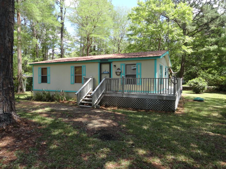 Quaint little Beach Cottage without the beach price tag! This charming 3 bedroom home is conveniently located less than 5 minutes to the 331 Bay Access, 10 minutes to Public Beach Access and 15 minutes to scenic beach towns. Close to everything, and yet tucked away on a quiet private street. The home offers an open living space with dine-in kitchen as well as a partial wrap around porch. Enjoy letting loose and relaxing while you listen to the crickets. Or why not take a walk down to the neighborhood's private access to the bay? This home would be perfect for those weekend getaways, family beach vacations, fishing trips, you name it! Come see it for yourself and fall in love with it's rustic coastal chic charm!