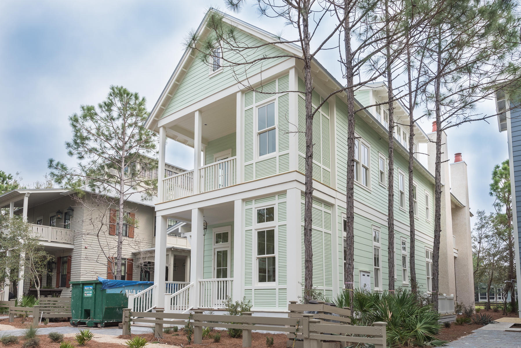 Impeccable new construction from local builder Romair Homes nestled in Phase II directly on the park at Camp WaterColor. This spacious coastal retreat offers over 3,800 square feet with four bedrooms, 5.5 bathrooms and an additional 1100+ square feet of outdoor living spaces. Design features include open concept living, ensuite bathrooms for each bedroom, an exquisite master suite with fireplace, a large 3rd story secondary living area with bunk room and full bathroom and two expansive covered porches overlooking the park. Enjoy outstanding finishes such as dune grey oak hardwood floors, Carrera marble countertops, glass bathroom tile, commercial appliances and shiplap walls. The natural trees provide plenty of privacy and shade, and the homesite allows room for the addition of an outdoor kitchen and pool if buyer wished to add. Located on 499 acres in the renowned South Walton Beaches, WaterColor was created with families in mind and offers the charm of small town life. Exceptional community amenities include six beautiful swimming pools, a Gulf front beach club, nature trails, a Boathouse offering kayaking, canoeing and paddleboarding, a fitness center, outstanding tennis facility, Camp WaterColor for kids, parks and lush green spaces.