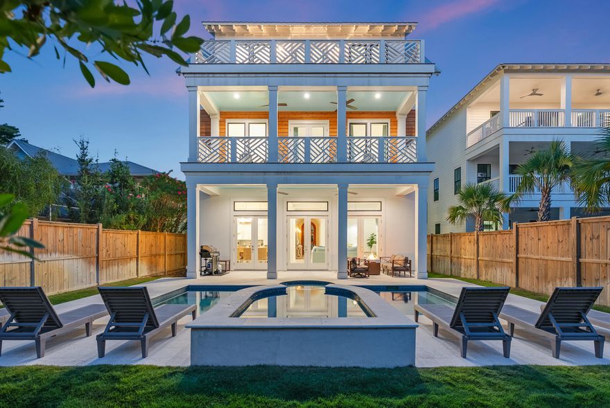 Offering a Watersound Beach Club Membership with acceptable offer!Positioned along the iconic 30A corridor, 212 S Gulf Drive offers 5,141 square feet of thoughtfully designed coastal living, blending scale, sophistication, and lifestyle. Spanning three levels, this six-bedroom, five-full and two-half bath residence features open, light-filled spaces that capture both comfort and elegance. The first floor centers on living, dining, and kitchen areas, where floor-to-ceiling windows frame views of the expansive backyard, pool, and hot tub. The chef's kitchen is outfitted with abundant cabinetry, a walk-in hidden pantry, and  abundant counter space for entertaining. Tall ceilings and refined finishes complement the home's thoughtful flow, while an in-home elevator provides seamless access to all levels.

The second and third floors each feature three bedrooms, accompanied by additional living spaces perfectly suited for media, game rooms, or quiet retreats. Bedrooms open to generous balconies, inviting morning coffee or evening sunsets over the surrounding landscape. Large closets throughout add both practicality and luxury.

Outdoors, the pool and spa create a private resort-like atmosphere. Just steps from Eastern Lake Beach Access, residents enjoy effortless access to the sand, as well as nearby restaurants, nature trails, and recreational amenitiesall accessible by bike, golf cart, or a short stroll.

212 S Gulf Drive is a residence where architectural detail, elevated design, and the dynamic lifestyle of 30A converge to offer a coastal living experience defined by elegance and ease.
