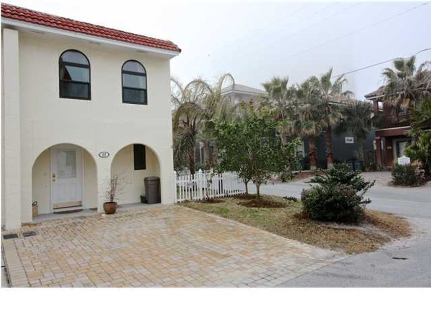Great Rental Opportunity! This end unit has been renovated and is being rented furnished. Two large bedrooms with each a private bath. Small fenced yard on the side for pets. Very short walk to the beach access.