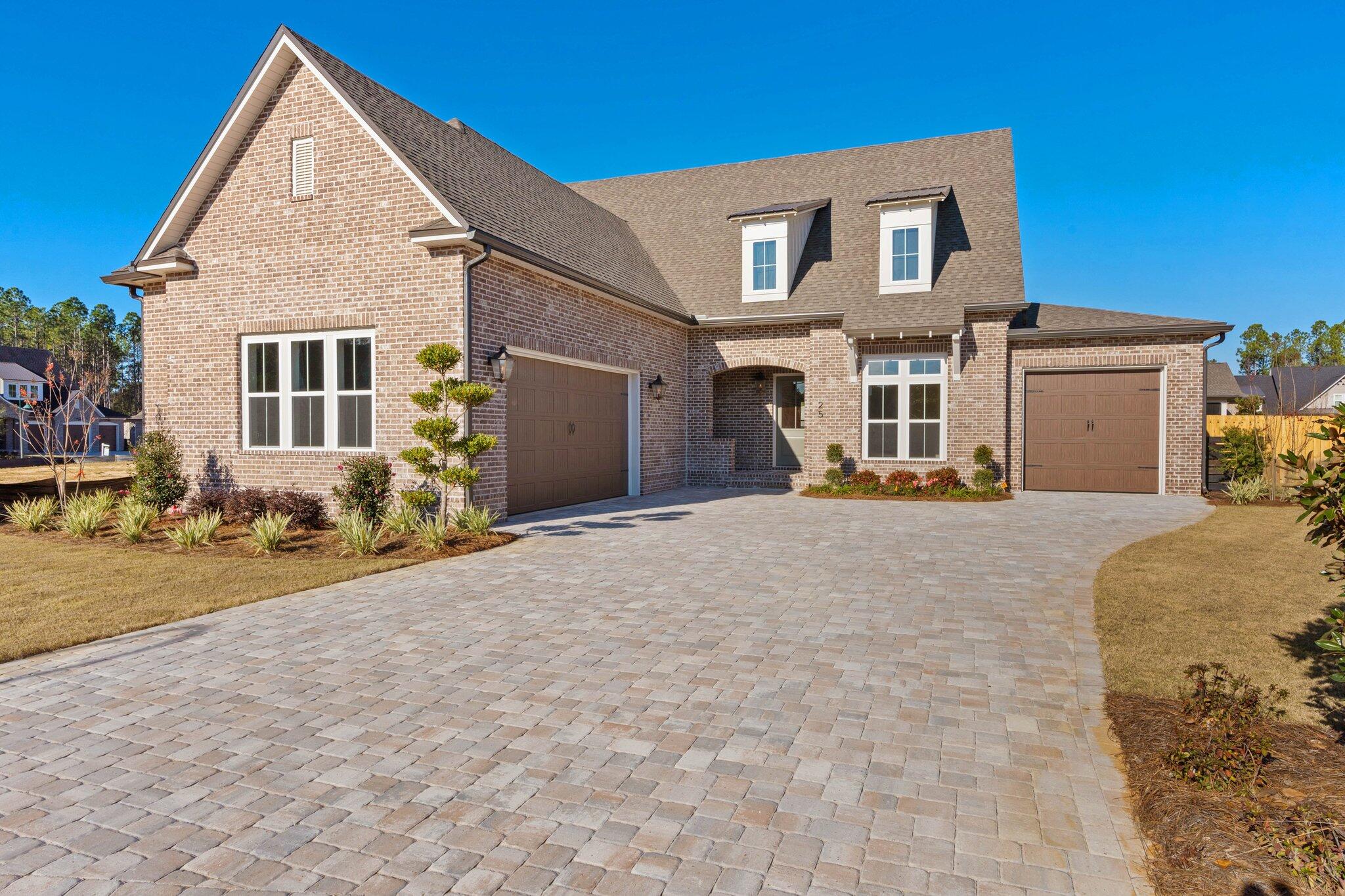 Move-In Ready Home in The Vineyards at Hammock BayLocated in the gated community of The Vineyards, this home sits on an oversized homesite with a 3-car garage, paver driveway, and gas lanterns. The first floor boasts soaring 10' ceilings, enhancing the open-concept design. The study features 8' glass French doors and a private bath. The gourmet kitchen includes Cambria countertops, a gas cooktop, full-size fridge and freezer, and Wood Harbor Cabinets. The family room offers a full fireplace and abundant natural light. Upstairs, a spacious game room includes a bedroom, bath, and walk-out bonus space. Screened-in rear porch with summer kitchen, custom trim details, and elegant finishes throughout.