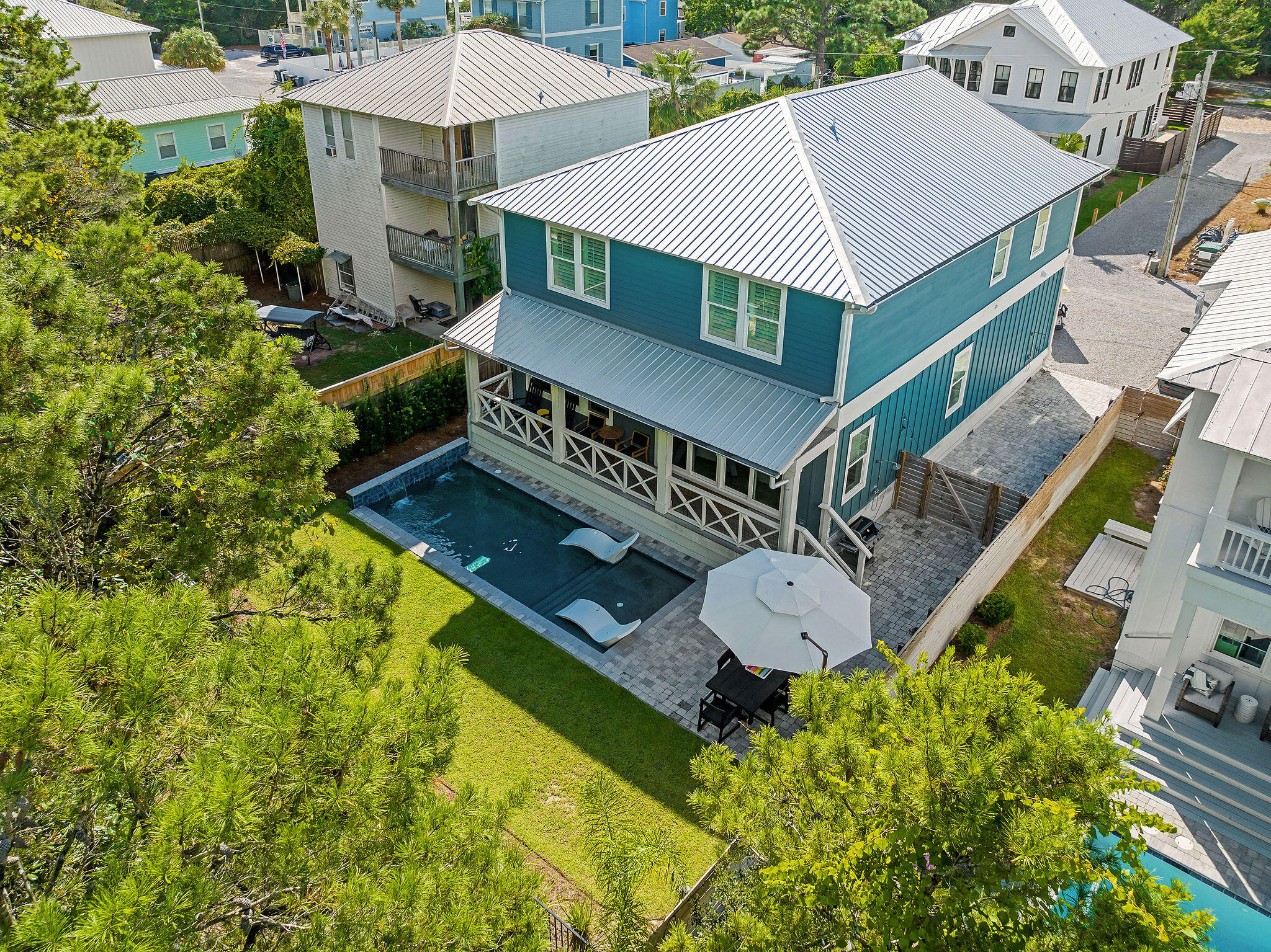 Welcome to your ideal sanctuary in the iconic Seagrove Beach, an exquisitely designed custom home with curated finishes that radiates sophistication and beach living This Coastal property comes fully furnished with curated design element. The six-seater golf cart conveys; a two minute ride to the beach access at the Eastern Lake neighborhood beach access. Currently on 360 Blue rental management program and producing solid rental income.The expansive living area invites effortless entertaining, custom furnishings include: Four Hands Sage Counter Stools and Nuevo chairs. A Worlds Away Dining Table serves as the perfect centerpiece for gatherings, while the Four Seasons Reese Sectional and Miles Chairs provide both comfort and sophistication. Relax around the oversized midnight blue breakfast bar with quartzite and additional seating for large parties at the dining table. The dry bar is stocked with a wine cooler and a cool pop of peacock blue with wall tile! Enjoy the view with multiple windows offering a view of the outdoor oasis.
The pinnacle of the home is the outdoor pool and green space.. Step outside to enjoy your private backyard oasis complete with a heated pool, outdoor showers, and a lush lawn.
The primary is on the main featuring a luxury Bernhardt Axiom Panel King Bed, complemented by a Gabby Chiri Chest and Albany Side. This retreat is enhanced by the warm glow of Gabby Anniston and Regina Andrew Milos Sconces.
The bunk room, featuring four custom built-in twin over full beds accented by a Four Hands Rosedale Dresser and enhanced by delightful Newport Sconces.
The upper bedrooms boasts a Four Hands Beds alongside a stylish Allegra Dresser and Delilah Nightstands, all accented by chic glass lamps, creating an elevated luxury vibe.
A vibrant Gabby Clara King Bed in Plush Mustard, matched with a sleek Worlds Away Dresser and refined Gabby Navy Drink Tables, ensures a dynamic yet comfortable livability. Sectional and Miles XL Chairs provide both comfort and sophistication.
Designed with energy efficiency in mind, this exceptional home features a durable block foundation and advanced insulation for soundproofing.
There is ample parking with five spaces and cruiser bikes. Take an evening stroll to Greenway Station or ride over to Seaside and Watercolor in you six seater golf cart to enjoy all of the entertainment and dining choices.