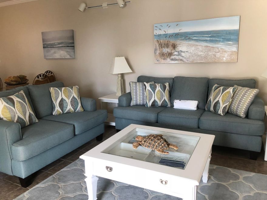 Beachwalk 2nd level. Great condition. Freshly painted, new water heater, washer/dryer, comfortable furnishings. Ready for your family to enjoy! Currently sleeps 6. Beachwalk section was built in 1996 and the floor plan was expanded to include larger open living areas, 9' ceilings, vinyl siding, owners closet, pantry closet. Rear deck has a pass through window from the kitchen for easy entertaining. Beachwalk section also has the newest pool that is heated in the winter months and with 3 hot spas. Very short walk to the beach and all of Sandpiper's amenities.