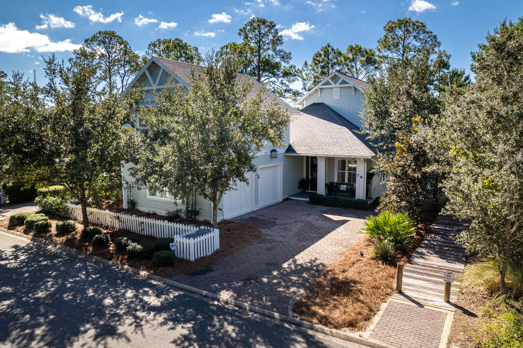 Under contract with 72 hour kick out clause. Stunning lake front home south of 30A in Watersound West Beach. The calming color palette, soothing decor and functional floor plan exudes warmth, comfort and elegance. The oversized screened porches on both the first and second level overlooking a tranquil lake expand the living space for entertaining or create space for relaxing with your favorite book and beverage. The gated entry, neighborhood trails, community pool, deeded beach access and prime location on 30a will enhance your 30A lifestyle. If its just you.. the home lives large and easy with master on main, if your pack is larger there are 4 additional en suite bedrooms, two with porch access and a carriage home with private entry, full kitchen.... your guests wont want to leave.