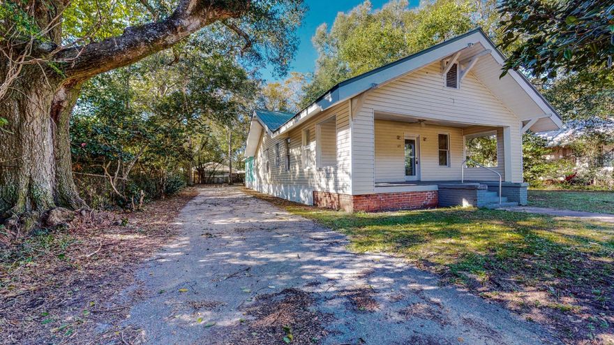 Cute craftsman with lots of original details, along with a number of updates, making this home both charming and affordable. Newly refinished, gorgeous hardwood floors greet you in the living room. Living room is open to the dining room. Two bedrooms were opened up to make one large master bedroom (could easily be returned to 2 separate bdrms, creating a 4 bedroom home again). Bathrooms have been updated and home has also been painted recently inside. All new ducting and HVAC unit were installed the end of 2016. Large eat-in kitchen, walk-in pantry and separate dining room give you lots of space to prepare meals and spend time together as a family and with friends. Fenced back yard and metal roof complete this quaint home. Don't wait to set your private showing appointment today.