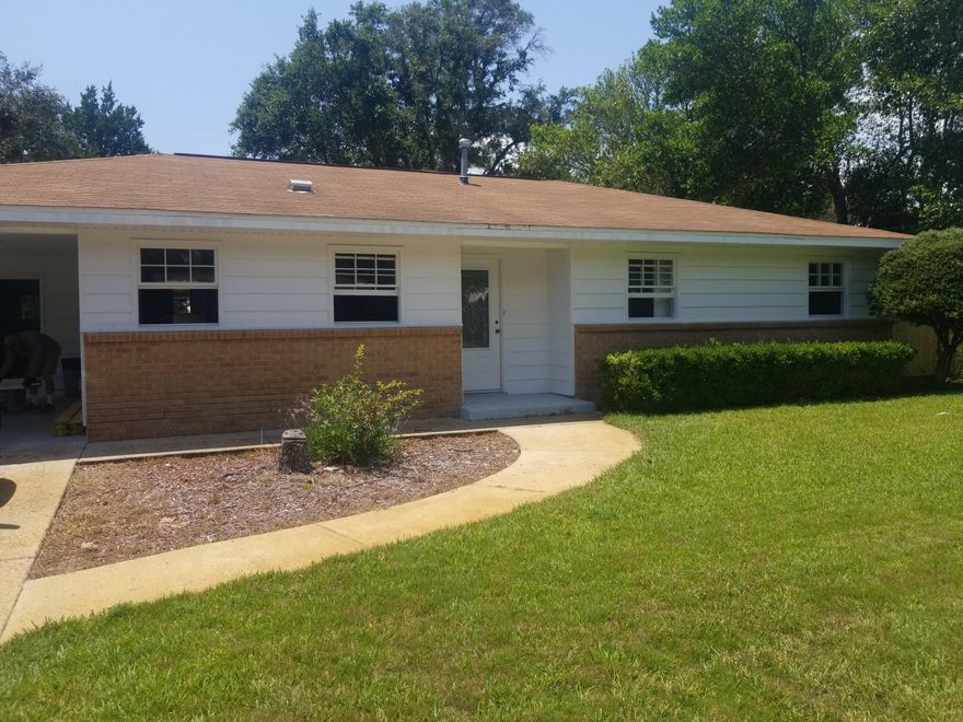 Entered MLS for comp purposes only  Interior and exterior completely renovated.  New tile, toilets, vanities, and fixtures are new.  Kitchen has new cabinets, new granite counter tops, new flooring and new appliances.  Large screen patio and separate storage building