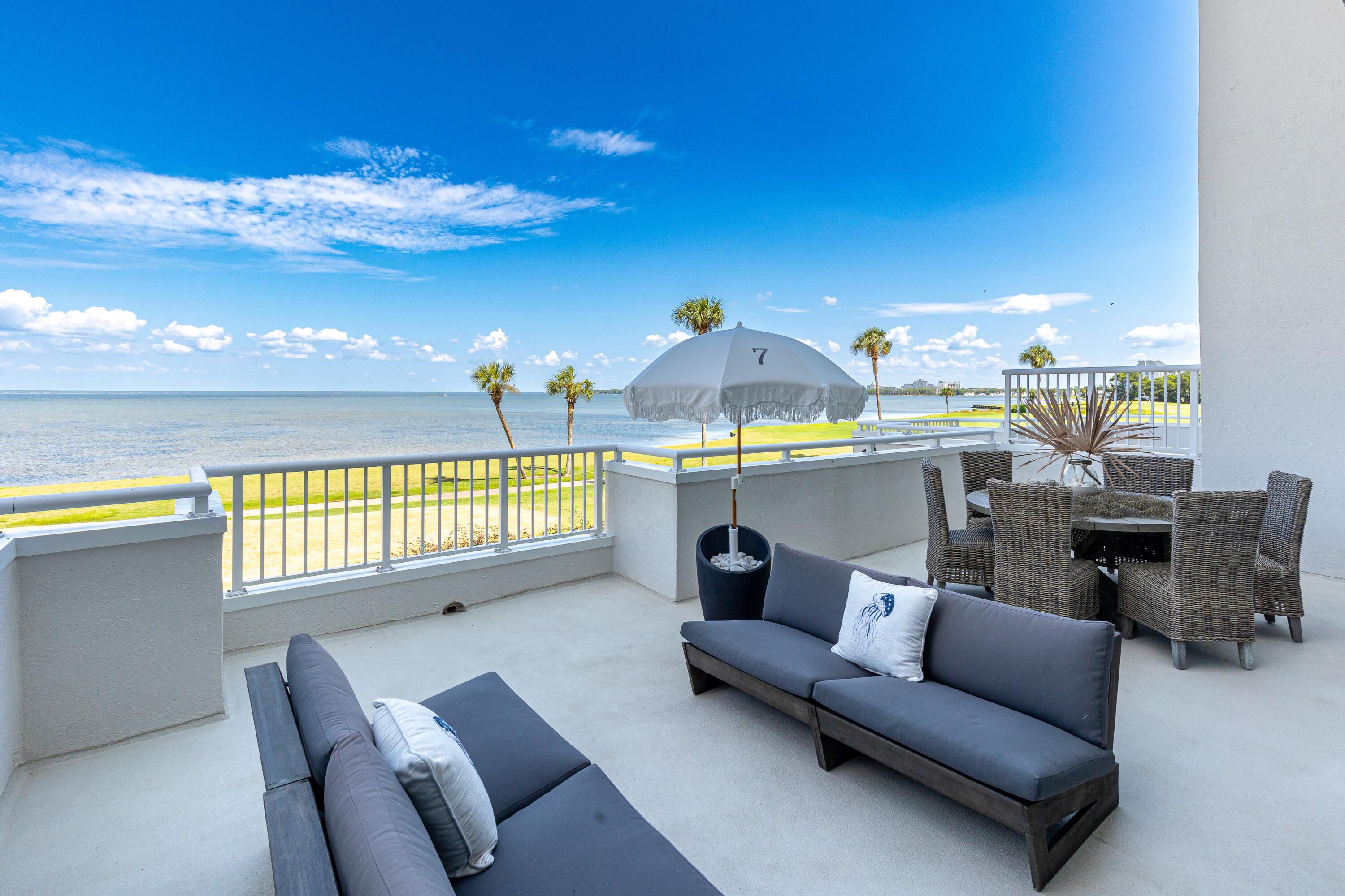 This priceless view comes with a completely reimagined luxury condo at 7 Players Club, showcasing exquisite craftsmanship, high-end finishes, and designer furnishings throughout. Offered fully furnished and complete with a 6-seater golf cart, this residence is move-in ready and designed for effortless resort living. An oversized balcony captures sweeping views of the Choctawhatchee Bay and the 9th Fairway of The Links Golf Course, making it the perfect backdrop for entertaining or relaxing.The open living area is filled with natural light and features hardwood flooring, custom curtains and shades, a designer dining fixture by Regina Andrew, and a remote-controlled fireplace for both ambiance and warmth. A dramatic new picture window and sliding glass door, along with all other windows, were replaced in 2022 with Miami hurricane-rated windows. The unit also carries a wind mitigation certificate, providing an advantage for insurance purposes.
The chef's kitchen is equipped with Bosch appliances, including an induction stove with warming drawer, convection microwave, and soft-close cabinetry, complemented by a new disposal. A new Frigidaire washer and dryer (2025, under warranty), Wi-Fi-enabled thermostat, and electronic Wi-Fi lock provide modern convenience and peace of mind.
The primary suite offers a true retreat with a fully redesigned spa-like bath featuring marble countertops, while the guest bath includes an extra-deep soaking tub and dual entries, accessible from both the guest bedroom and the foyer. Each bedroom is also complete with a smart TV.
Practicality meets convenience with a dedicated parking space in the first-level garage, perfectly positioned near the elevator and just one easy flight of stairs to the second floor. Additional highlights include a storage cage in the garage, custom furnishings with extra slipcovers, and building updates with both the Milestone and SIRS inspections already completed. Mechanical systems are under contract and inspected twice yearly, ensuring everything has been meticulously maintained.
Located in the Players Club within Sandestin Golf & Beach Resort, this exceptional property offers easy access to world-class golf, dining, shopping, and the sugar-white beaches that make this area so sought after.
As an introduction to the Sandestin lifestyle, we invite our new owners to explore amenities that make Sandestin special. The listing brokerage and seller(s) are presenting the buyer(s) of this property with (2) 90-minute rounds of Tennis court time, a golf foursome at one of our three championship courses, and a round of golf for up to four (4) players at the unrivaled Burnt Pine Golf Club.
Sandestin Golf and Beach Resort features more than seven miles of beaches and pristine bay front, four championship golf courses, 15 world-class tennis courts, a 226-slip marina, a fitness center, spa and celebrity chef dining. Shop, dine and play at the charming pedestrian village, The Village of Baytowne Wharf and more. Inside the gates of the resort, residents enjoy a balanced lifestyle of high-class living, spanning the 2,400 acres from the beach to the bay. Everything within the gates of the resort is accessible by golf cart or bicycle. The entire resort is interconnected by miles of pedestrian, bike and golf cart paths that weave through groves of live oaks, meandering past natural lagoons, fountains, man-made lakes, and meticulously landscaped fairways.