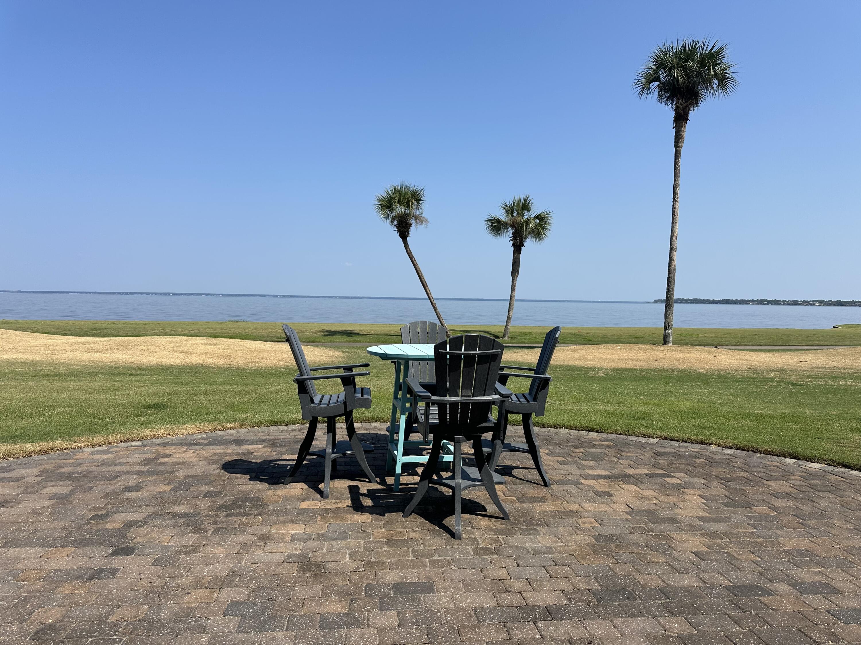 This priceless view comes with a completely reimagined luxury condo at 7 Players Club, showcasing exquisite craftsmanship, high-end finishes, and designer furnishings throughout. Offered fully furnished and complete with a 6-seater golf cart, this residence is move-in ready and designed for effortless resort living. An oversized balcony captures sweeping views of the Choctawhatchee Bay and the 7th Fairway of The Links Golf Course, making it the perfect backdrop for entertaining or relaxing.The open living area is filled with natural light and features hardwood flooring, custom curtains and shades, a designer dining fixture by Regina Andrew, and a remote-controlled fireplace for both ambiance and warmth. A dramatic new picture window and sliding glass door, along with all other windows, were replaced in 2022 with Miami hurricane-rated windows. The unit also carries a wind mitigation certificate, providing an advantage for insurance purposes.
The chef's kitchen is equipped with Bosch appliances, including an induction stove with warming drawer, convection microwave, and soft-close cabinetry, complemented by a new disposal. A new Frigidaire washer and dryer (2025, under warranty), Wi-Fi-enabled thermostat, and electronic Wi-Fi lock provide modern convenience and peace of mind.
The primary suite offers a true retreat with a fully redesigned spa-like bath featuring marble countertops, while the guest bath includes an extra-deep soaking tub and dual entries, accessible from both the guest bedroom and the foyer. Each bedroom is also complete with a smart TV.
Practicality meets convenience with a dedicated parking space in the first-level garage, perfectly positioned near the elevator and just one easy flight of stairs to the second floor. Additional highlights include a storage cage in the garage, custom furnishings with extra slipcovers, and building updates with both the Milestone and SIRS inspections already completed. Mechanical systems are under contract and inspected twice yearly, ensuring everything has been meticulously maintained.
Located in the Players Club within Sandestin Golf & Beach Resort, this exceptional property offers easy access to world-class golf, dining, shopping, and the sugar-white beaches that make this area so sought after.
As an introduction to the Sandestin lifestyle, we invite our new owners to explore amenities that make Sandestin special. The listing brokerage and seller(s) are presenting the buyer(s) of this property with (2) 90-minute rounds of Tennis court time, a golf foursome at one of our three championship courses, and a round of golf for up to four (4) players at the unrivaled Burnt Pine Golf Club.
Sandestin Golf and Beach Resort features more than seven miles of beaches and pristine bay front, four championship golf courses, 15 world-class tennis courts, a 226-slip marina, a fitness center, spa and celebrity chef dining. Shop, dine and play at the charming pedestrian village, The Village of Baytowne Wharf and more. Inside the gates of the resort, residents enjoy a balanced lifestyle of high-class living, spanning the 2,400 acres from the beach to the bay. Everything within the gates of the resort is accessible by golf cart or bicycle. The entire resort is interconnected by miles of pedestrian, bike and golf cart paths that weave through groves of live oaks, meandering past natural lagoons, fountains, man-made lakes, and meticulously landscaped fairways.